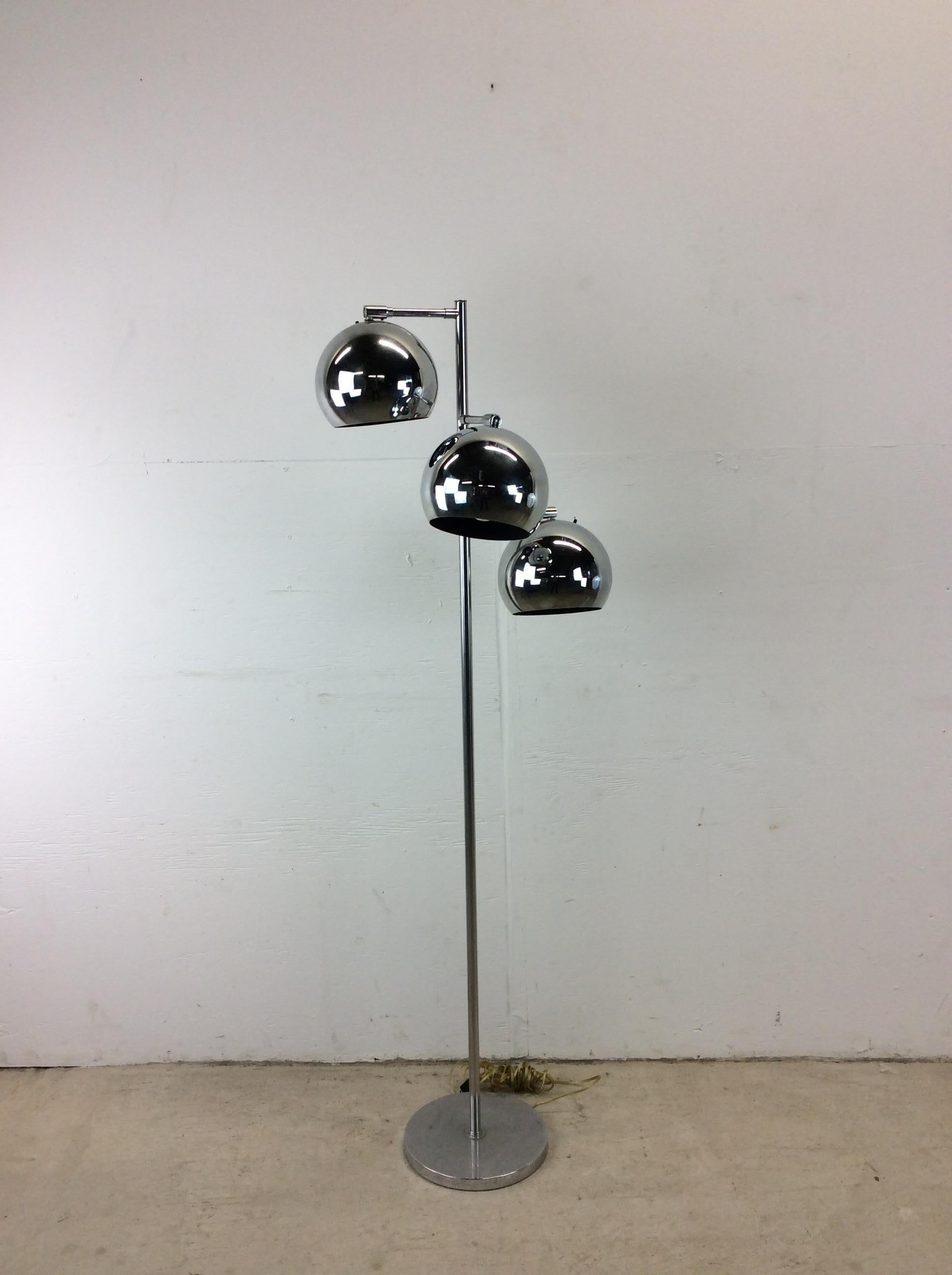 This mid century modern floor lamp by Koch & Lowy features original chrome finish, three adjustable globes with their own switches, fully functional vintage wiring, and round chrome base.

Dimensions: 24w 18d 59h

Condition: Original chrome finish