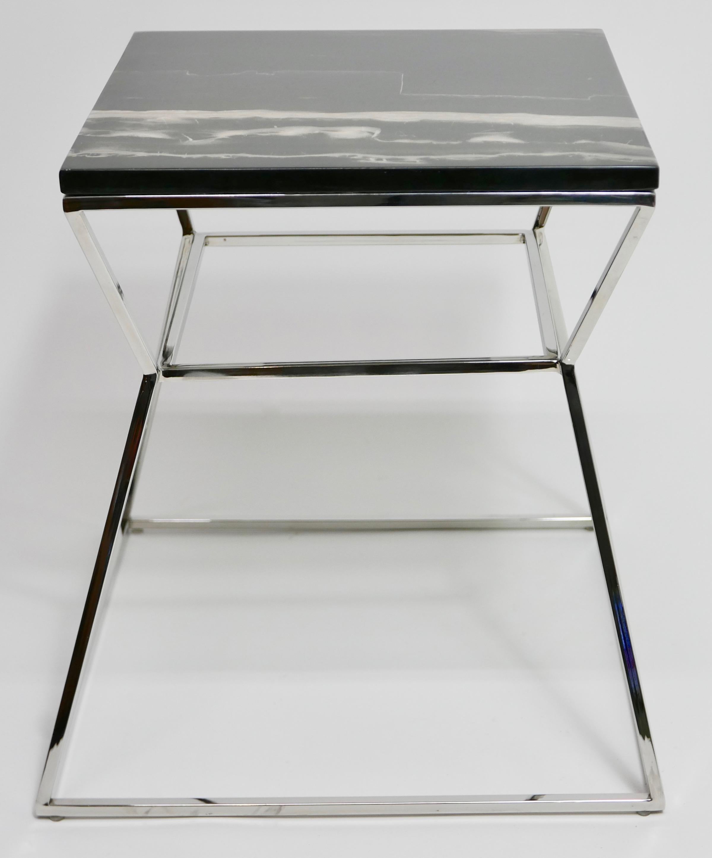 Modern black and white marble top on chrome metal angular base side or end table.
American, mid-20th century.