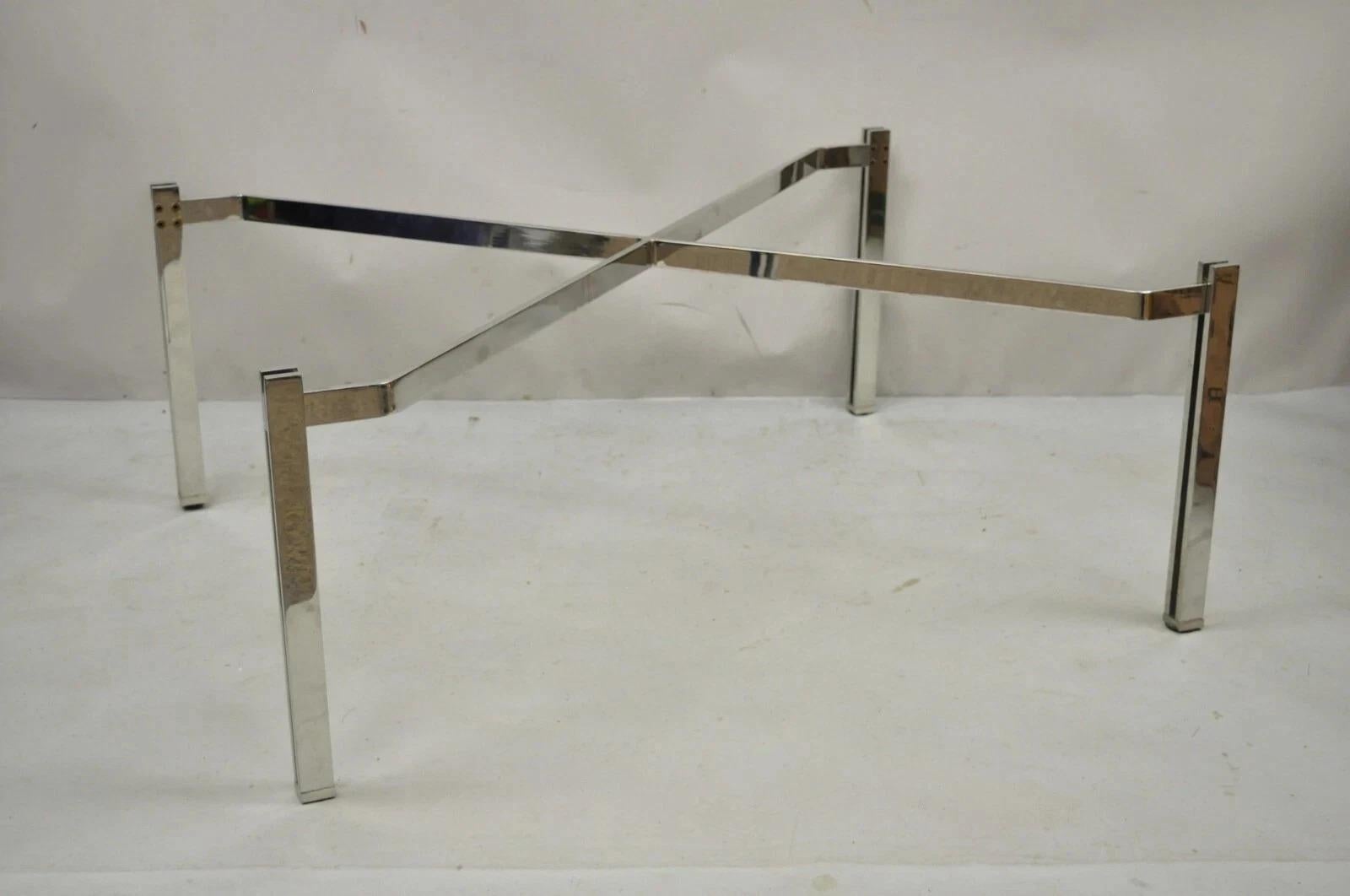 Please message us with your zip code to request a more reasonable domestic U.S. shipping quote.

Vintage Mid Century Modern Chrome Metal X-frame Baughman Style Coffee Table Base (No top). Circa Mid 20th Century. Measurements: 16