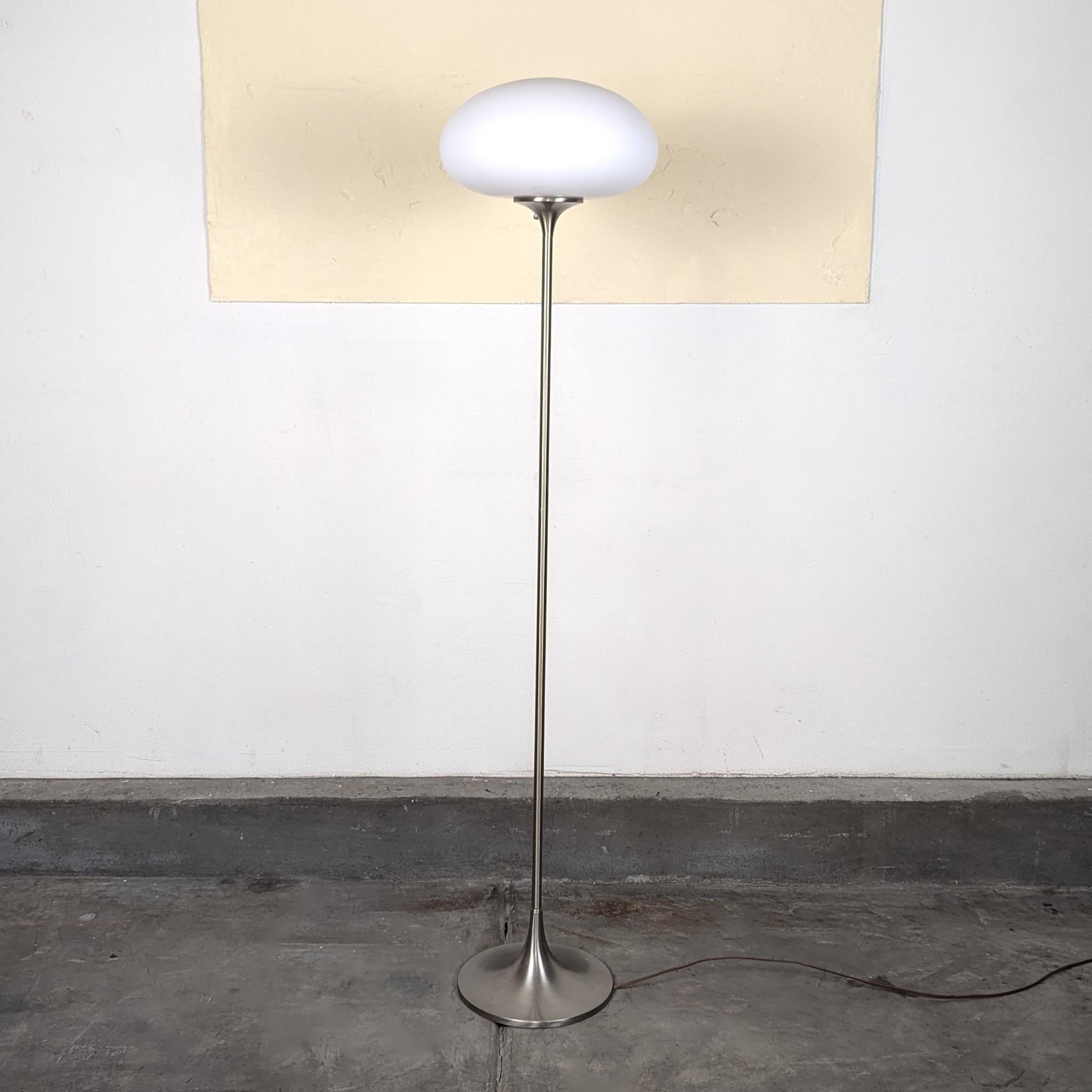 Introducing a stunning vintage Mid-Century Modern Chrome Floor Lamp by the renowned Laurel Lamp Co, dating back to the iconic 1960s. This exquisite piece features an original frosted glass mushroom globe in excellent condition, perfectly