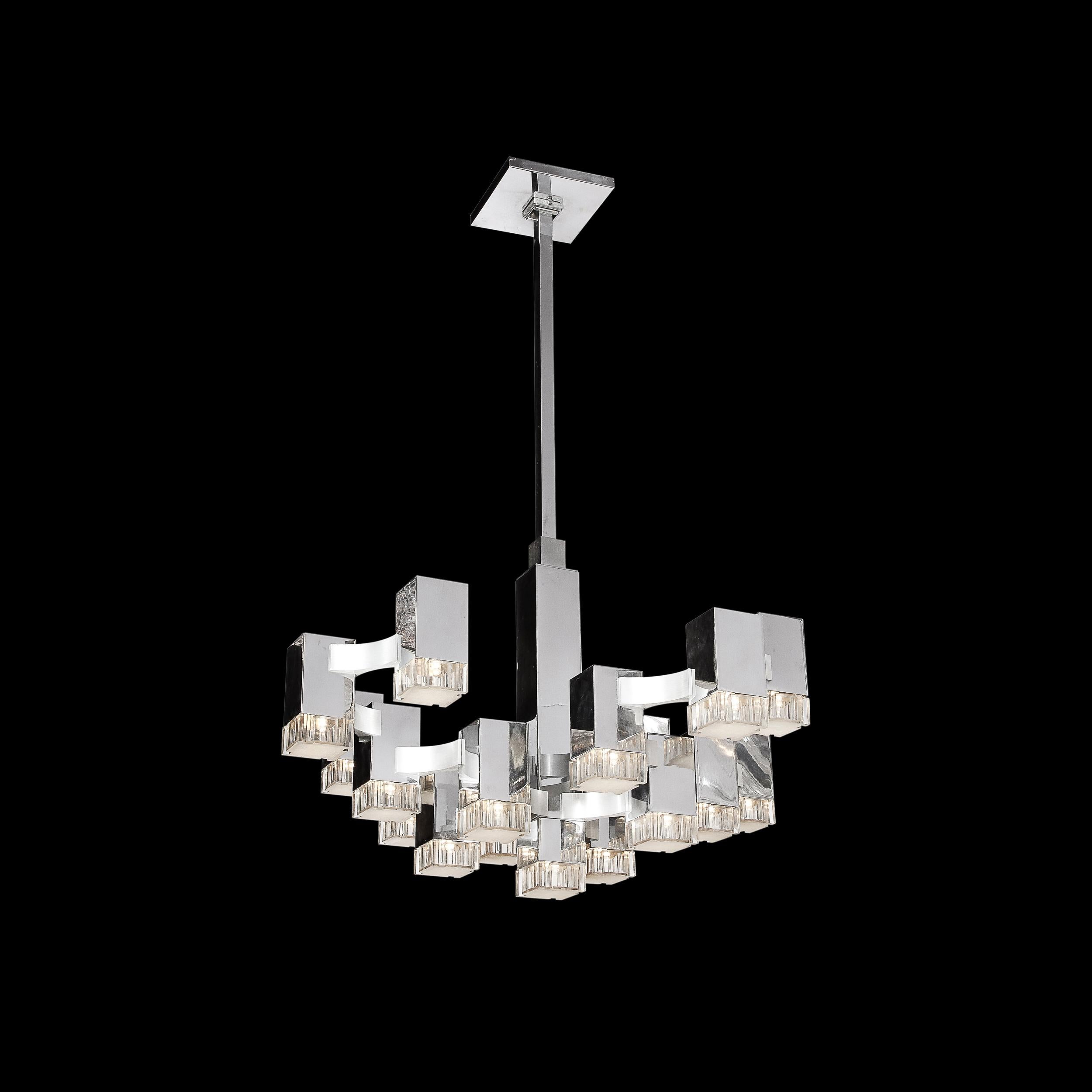 This stunning Mid-Century Modern chandelier was realized by the fabled designer Gaetano Sciolari in Italy circa 1970. In dialogue with the perenially modern forms of Art Deco, Sciolari has subtly recontextualized Machine Age design elements into an