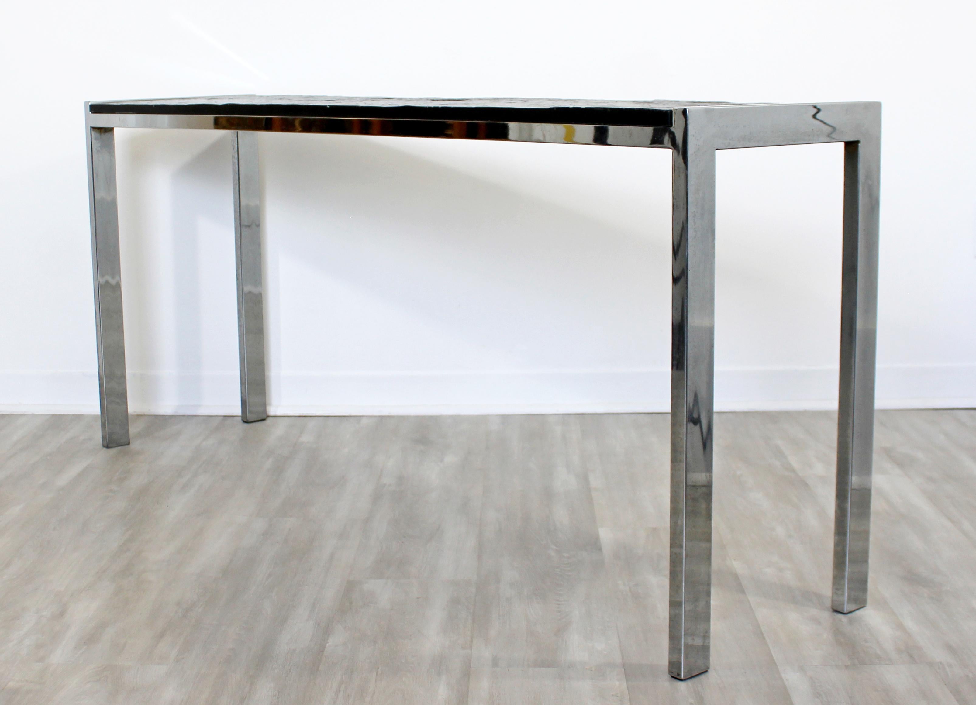 For your consideration is a simple and chic console table, with a slate top on a flat bar chrome base, in the style of Paul Evans or Milo Baughman, circa 1970s. In excellent condition. The dimensions are 60