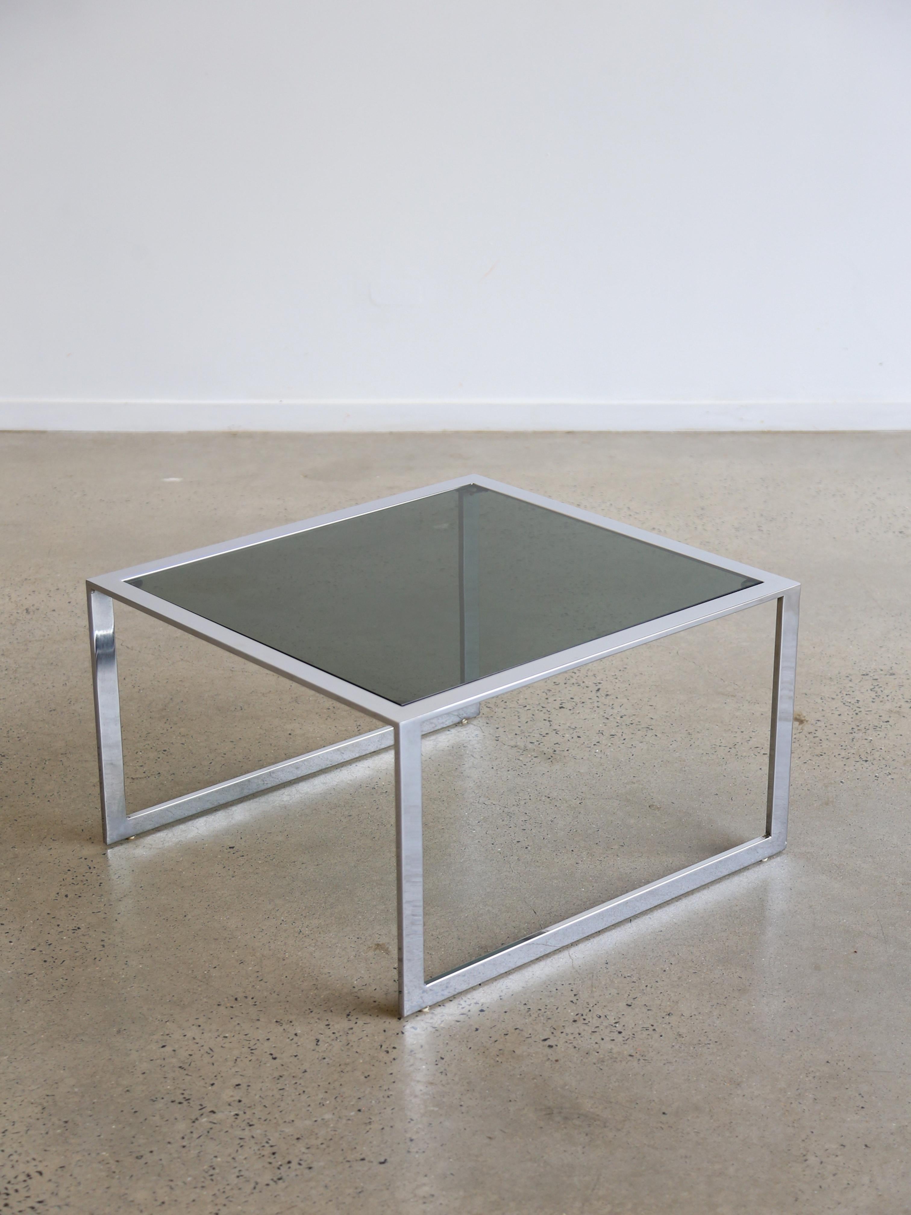 Mid-century modern design often incorporated geometric shapes, and a square-rectangular coffee table is a good example of this. The square shape gives the table a symmetrical and balanced look.

The use of chrome or polished metal frames is a common