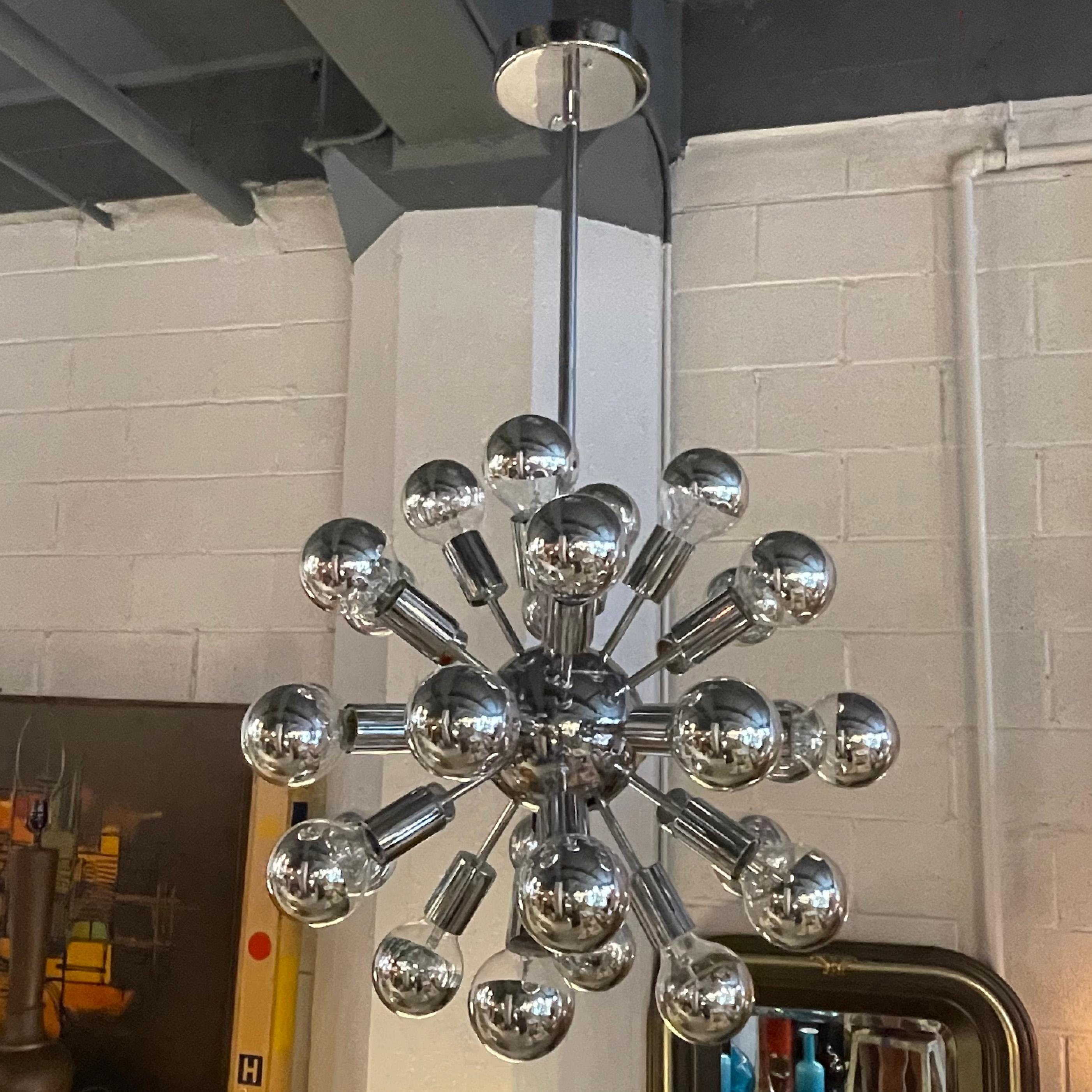 Fantastic, Mid-Century Modern, chrome, sputnik chandelier attributed to Sonneman feautres multiple stems that form a 15 inch sphere on a chrome pole and canopy. The chandelier is shown with chrome tipped bulbs but any medium socket bulb of choice up