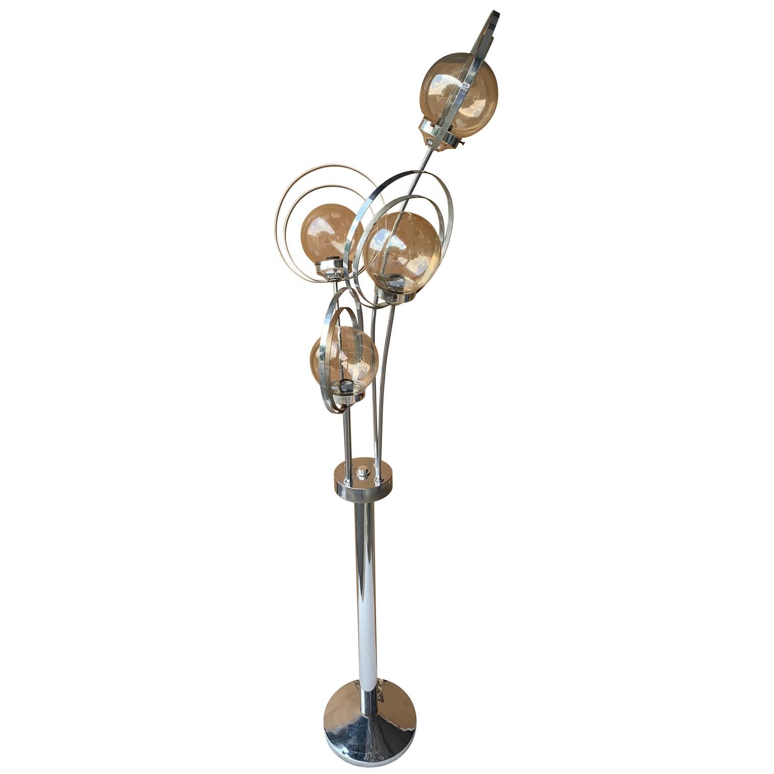 Mid-Century Modern chrome sputnik floor lamp

Floor lamp has lightly smoked glass globes

Lamp is newly re-wired.
 