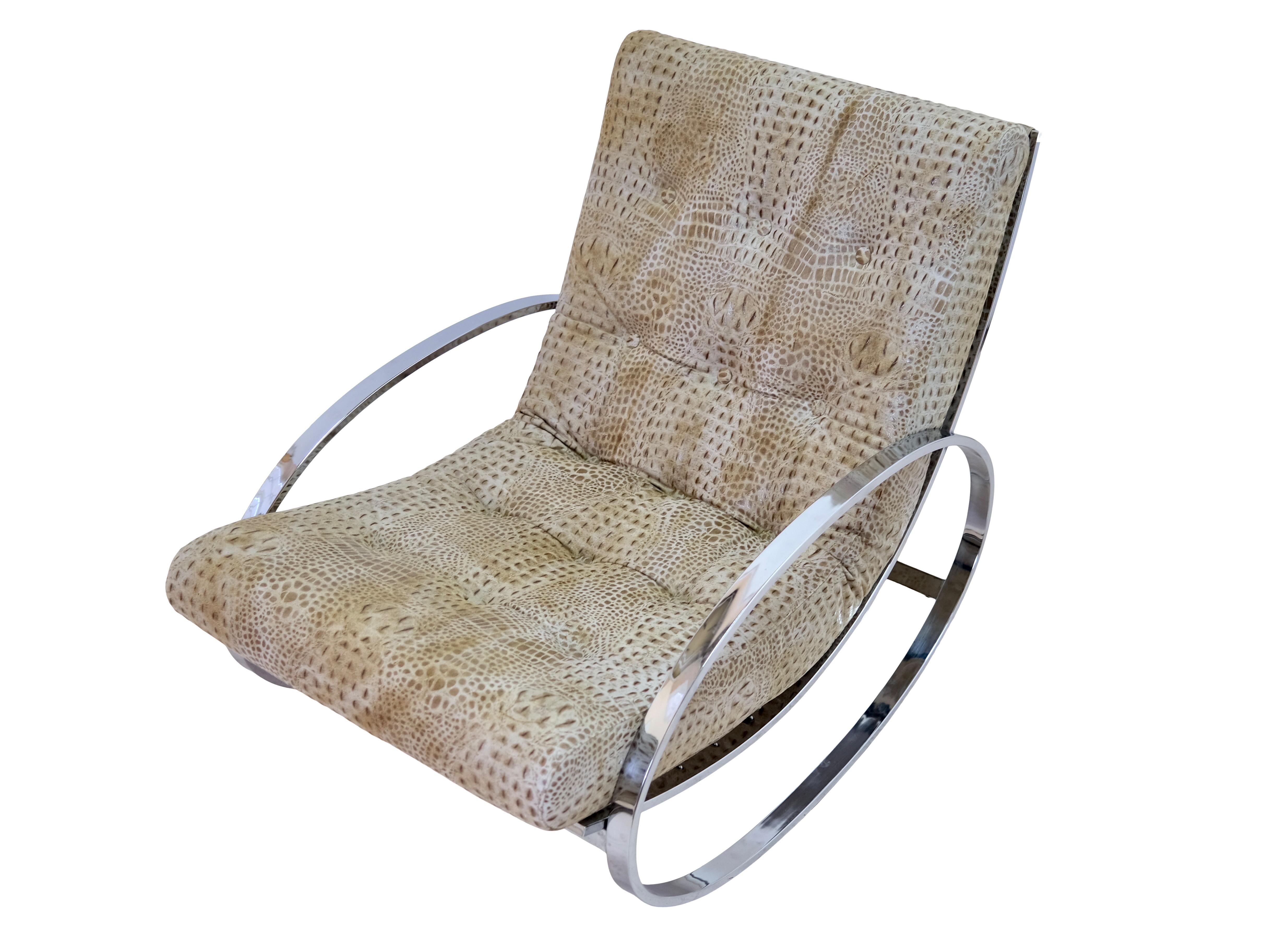 Mid Century Rocking Chair with Crocodile Embossing

Rocking chair / armchair
Square tubes with original chrome plating
Freshly upholstered, genuine leather with croco embossing

Mid-Century, 1960s

Dimensions:
Width: 70 cm
Height: 85 cm
Depth: 110