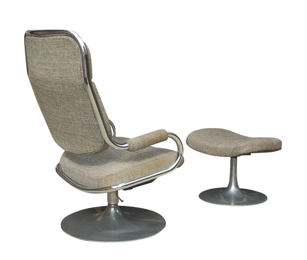 A super mod lounge chair and ottoman set staraight out of the 1970s. It features chrome tubular framing, tulip bases, swivel and reclining capability, and tweed upholstery. Fabric is soiled and needs recovering.
