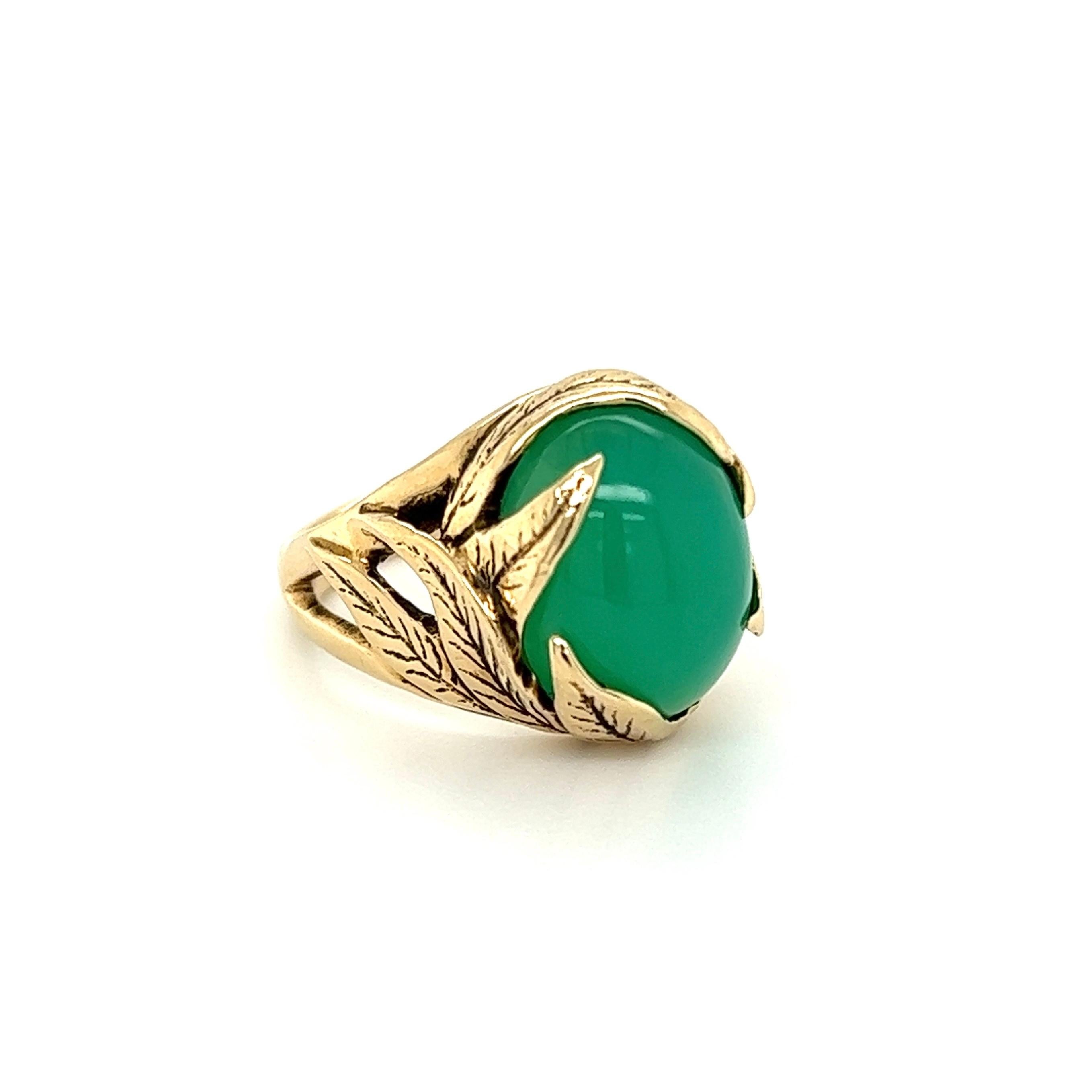 Simply Beautiful! Vintage Mid Century Modern Chrysoprase Gold Solitaire Cocktail Ring. Centering a Hand set securely nestled Chrysoprase. Hand crafted 14K Yellow Gold foliate mounting. Approx. Dimensions of the ring: 1.00