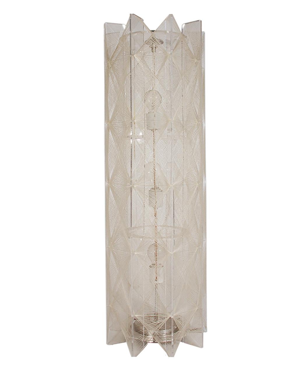 A large and impressive work of art from the early 1970s. This lamp features a clear acrylic frame and nylon string. It works on 3 standard bulbs. Tested and ready for use.