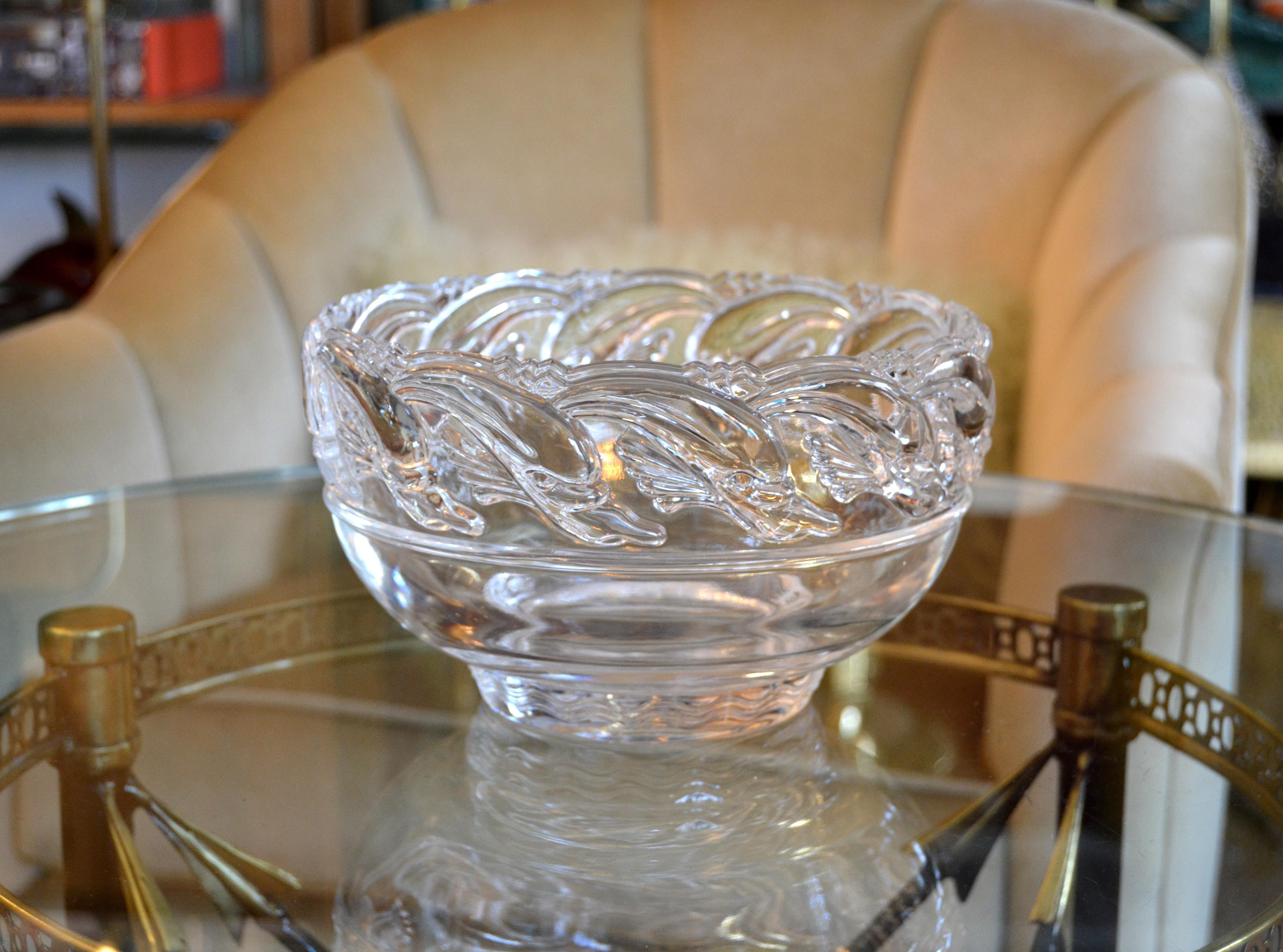Mid-Century Modern clear Tiffany & Company art glass crystal footed bowl with Dolphins.
Marked underneath, Tiffany & Co. 
Simply Lovely and made with great craftsmanship.