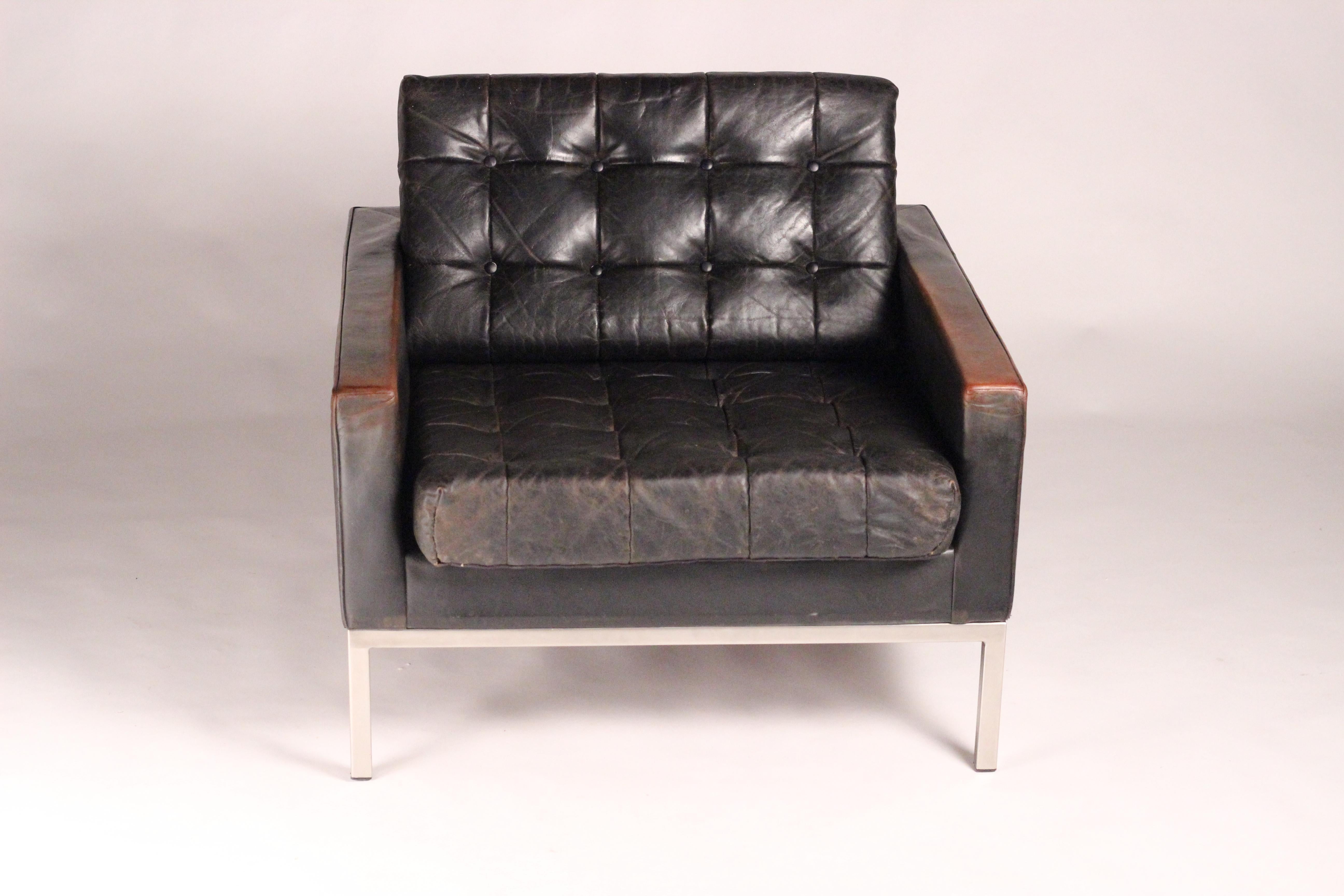 English Mid-Century Modern Club armchair in Leather by British Designer Robin Day
