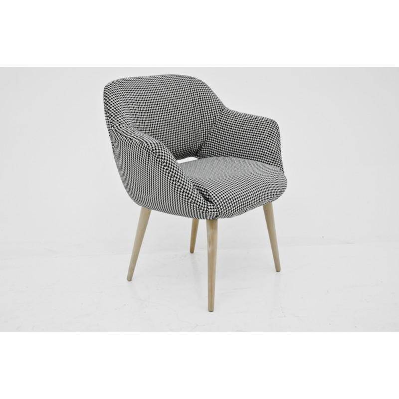 The club armchair made in Poland in the 1960s. Furniture is after renovation and change of upholstery. The set includes a footrest upholstered in the same fabric in houndstooth.
Mid-Century Modern style.