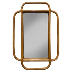 Espejo de pared de ratán curvado de estilo costero moderno de mediados de siglo