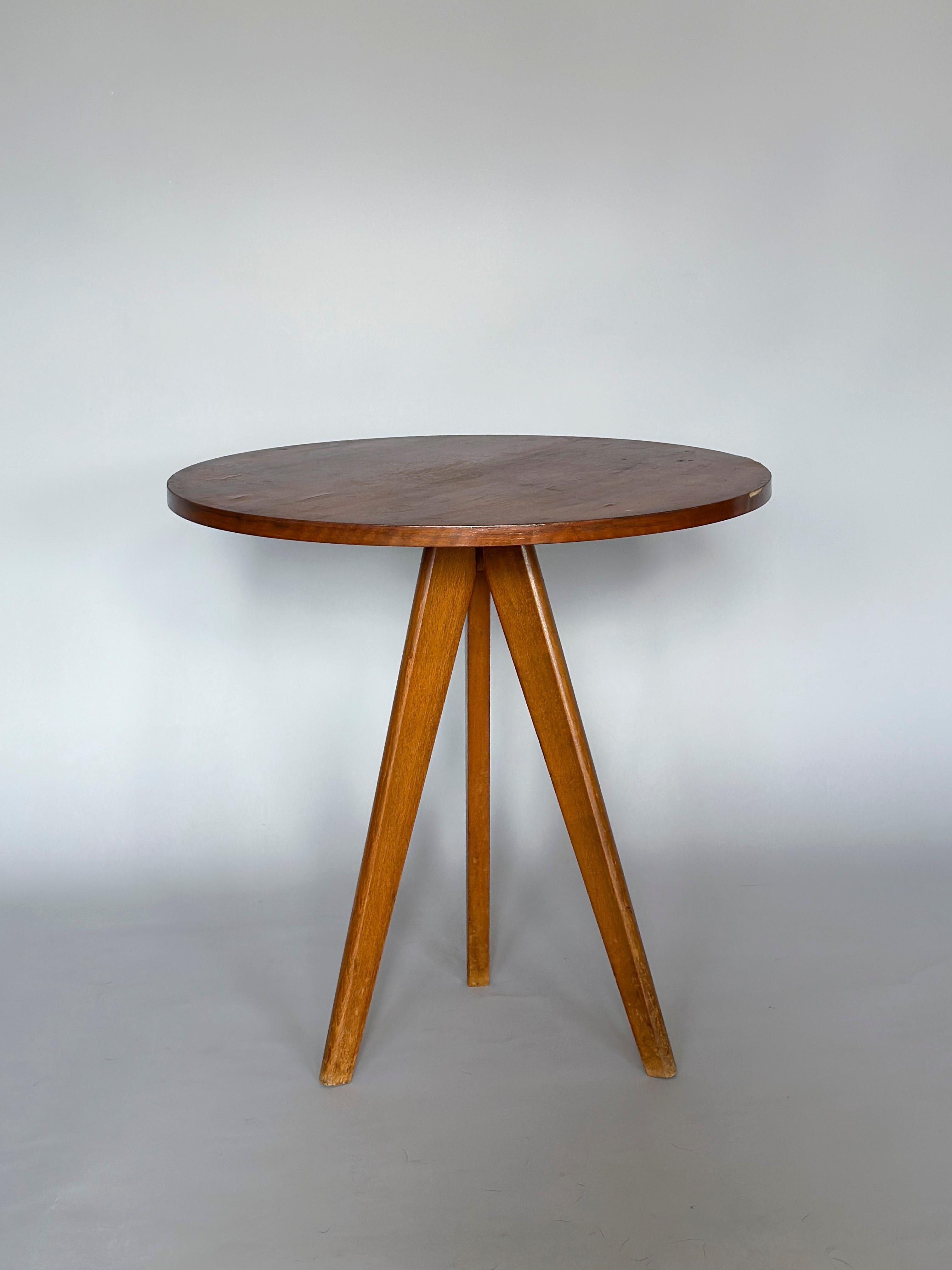Elegant and simple Mid-Century Modern coffee table by Jean Prouve (Prouvé) from circa 1950.



