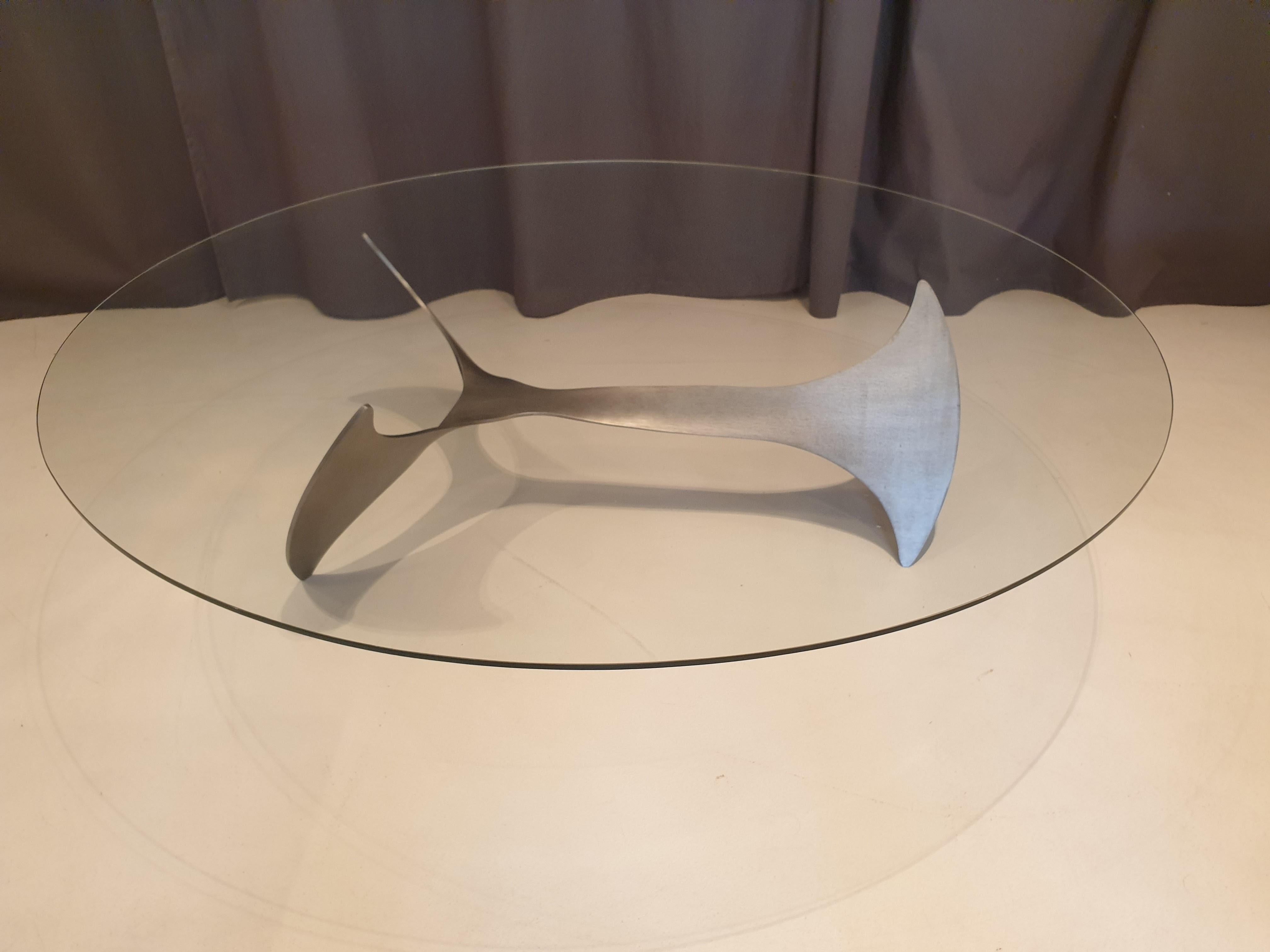 Aluminium sculptural coffee table with glass top by Knut Hesterberg.


 