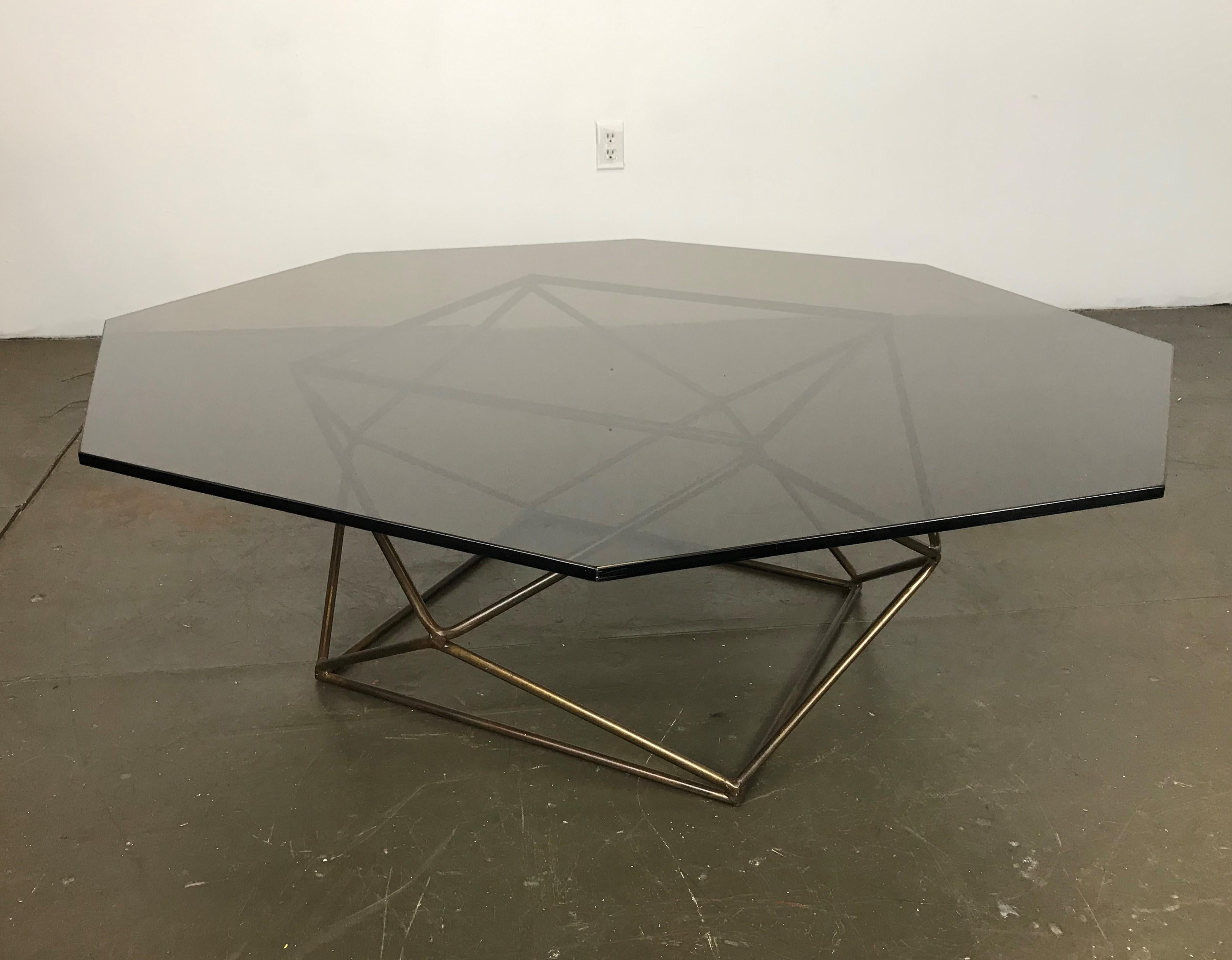 Excellent Minimalist Mid-Century Modern octagonal smoked glass coffee table with a 18 sided polygon bronzed finish over metal base. Designed in the early 1970s by Milo Baughman for Directional. 

The base is in nice shape with patina. The top -