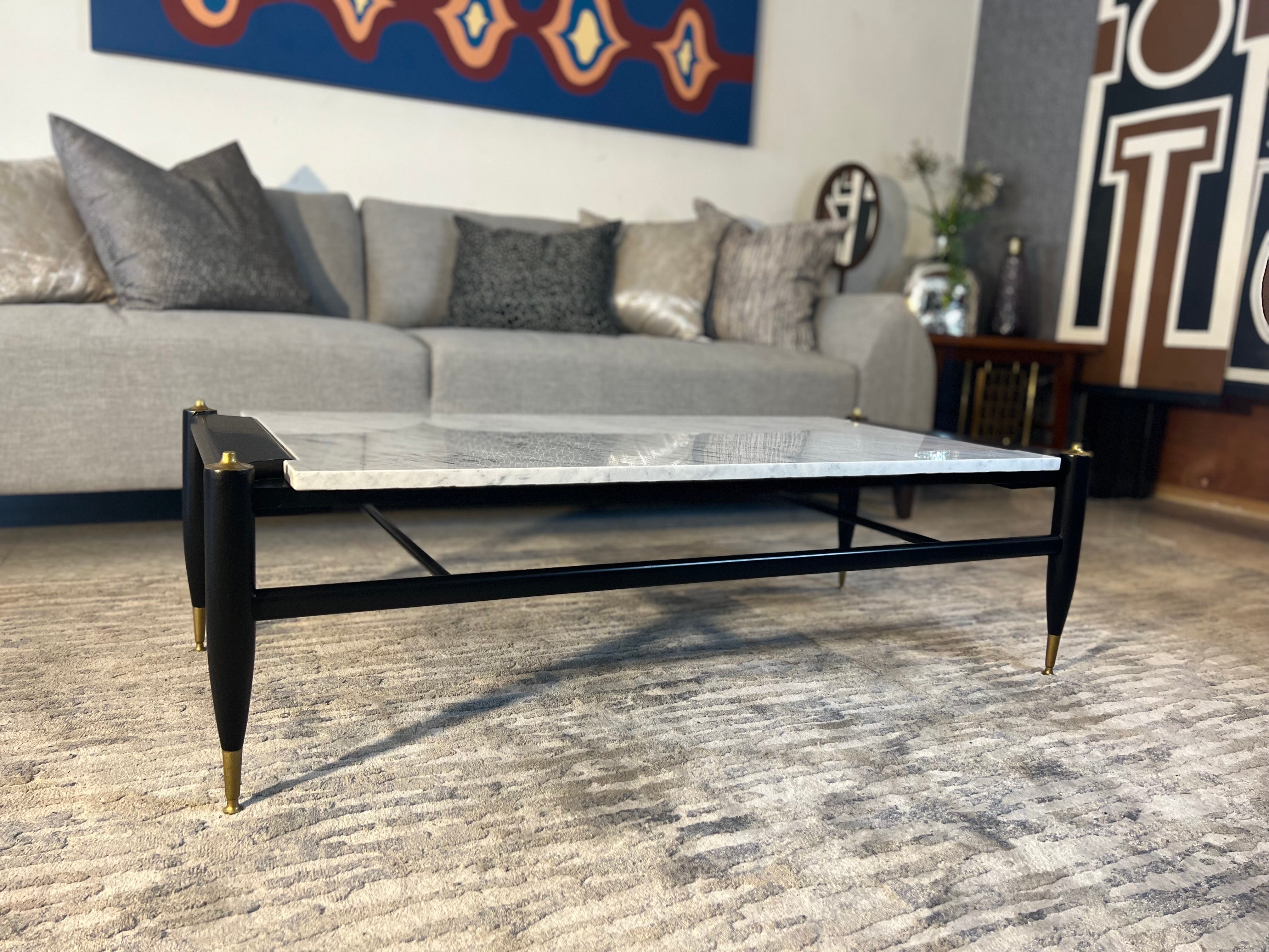 Mid-sixties rectangular table, pin legs with brass details