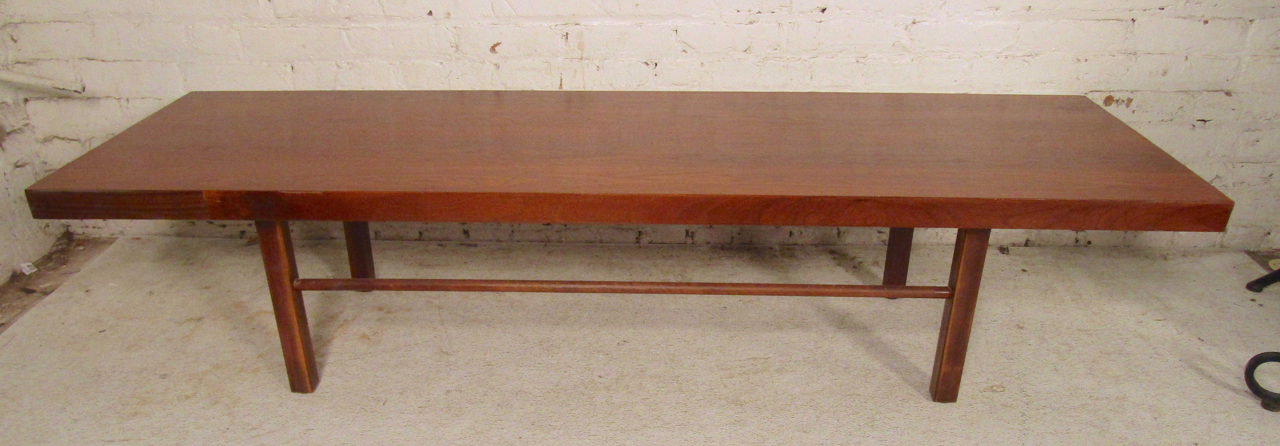 Long modern style walnut table or bench for home and office use.
(Please confirm item location - NY or NJ - with dealer).
 