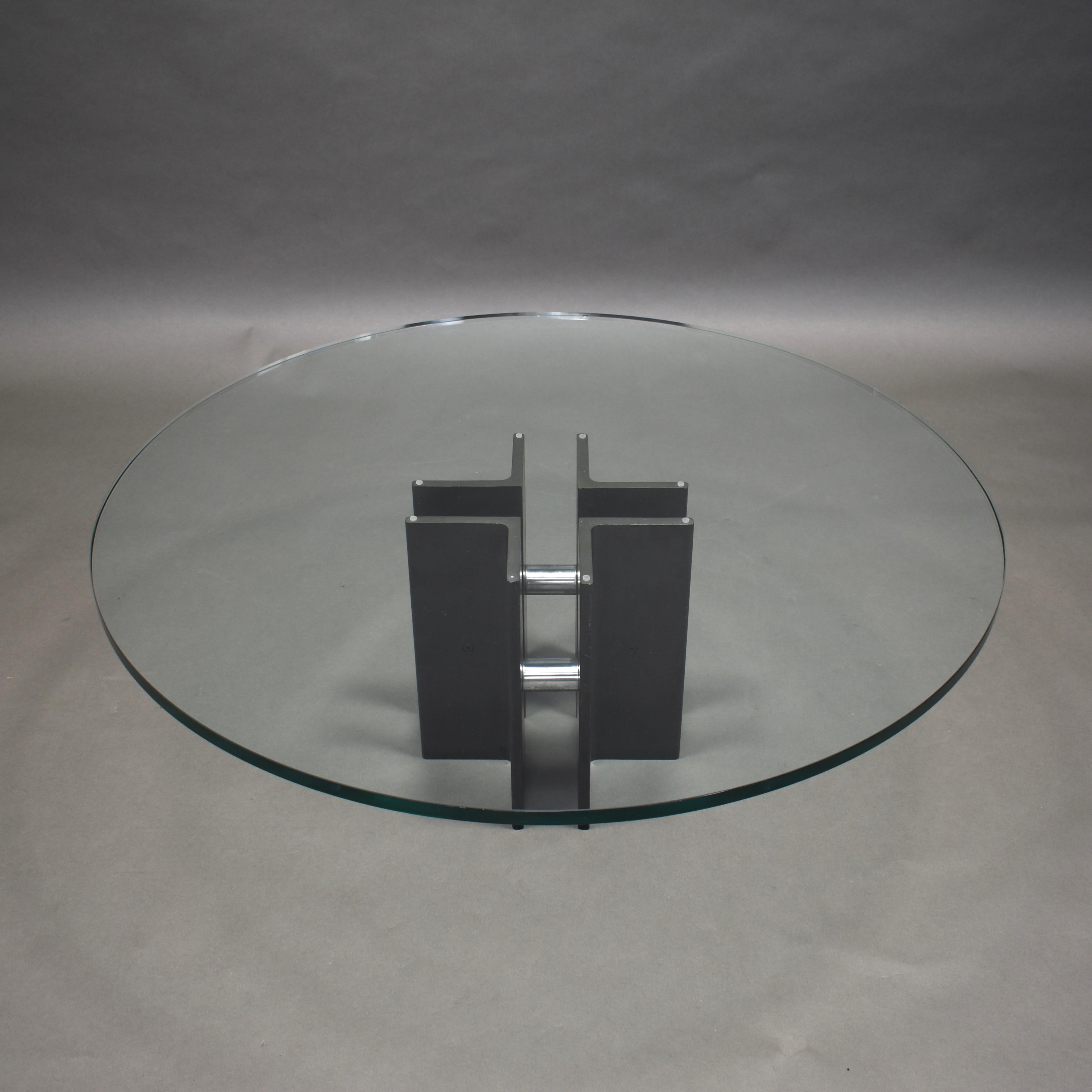 Midcentury coffee table in heavy steel, chrome and glass.

Designer: Unknown

Manufacturer: Unknown

Country: Unknown

Model: coffee table

Material: Steel / Chrome / Glass

Design period: circa 1970s

Condition: Good / Small chip in the glass /