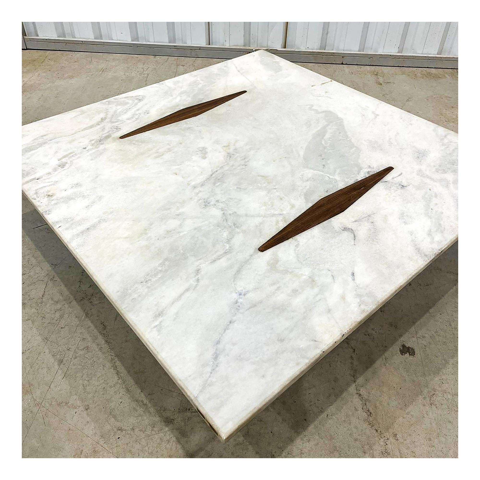 Available now, this Mid-Century Modern Coffee Table made in Wood & Marble by Jorge Zalszupin in Brazil in 1959 is a masterpiece!

The “Limestone” coffee table is a stunning example of minimalist design. Its use of materials including rosewood legs