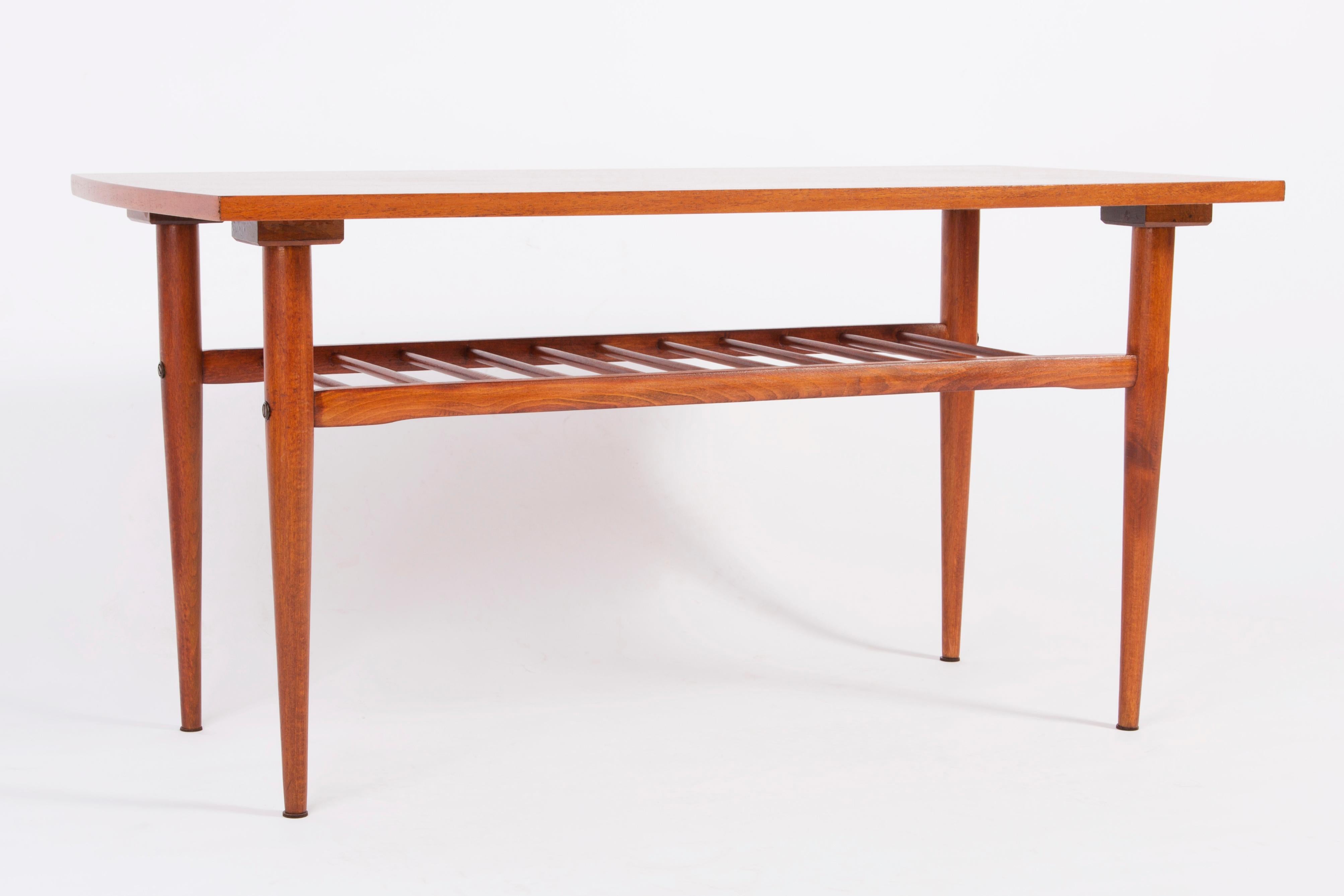 Coffee table from the 1960s. It was manufactured in Poland in 1960s. The table was made of wood and veneer plywood, it was also full renovated. Excellent condition.