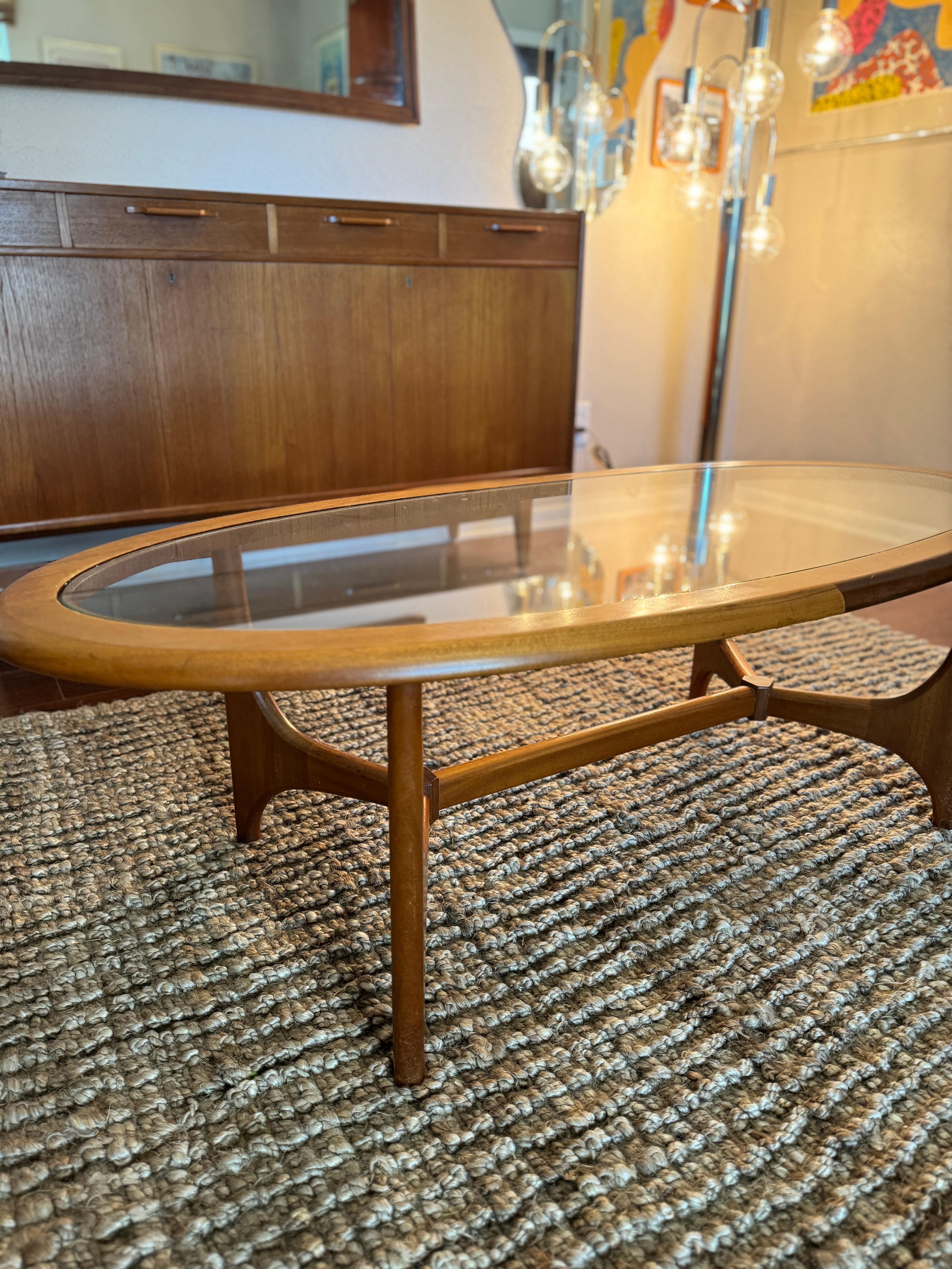 Mid century modern coffee table with a glass top by Stonehill, circa 1960s 4