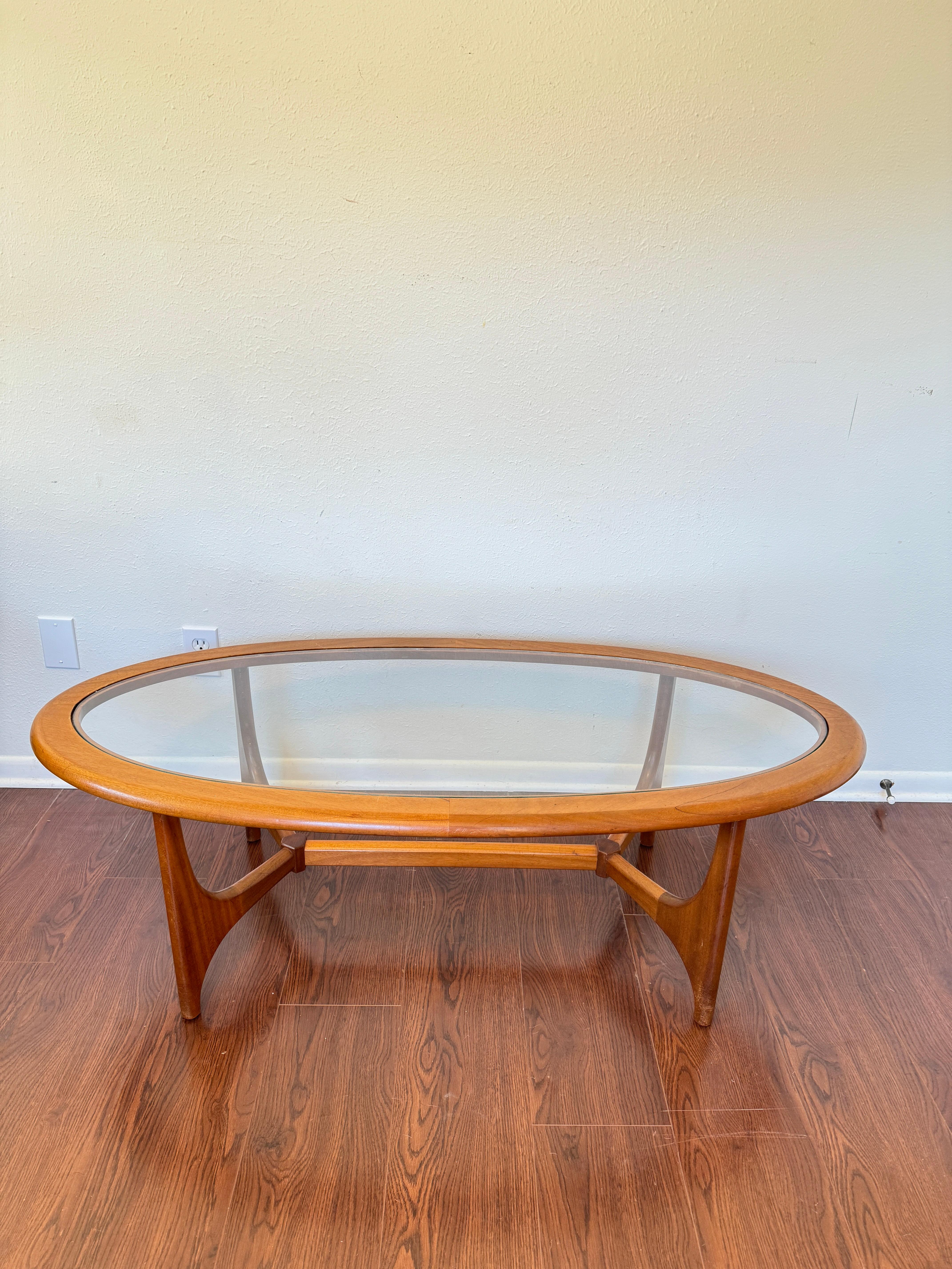 Mid century modern coffee table with a glass top by Stonehill, circa 1960s 1