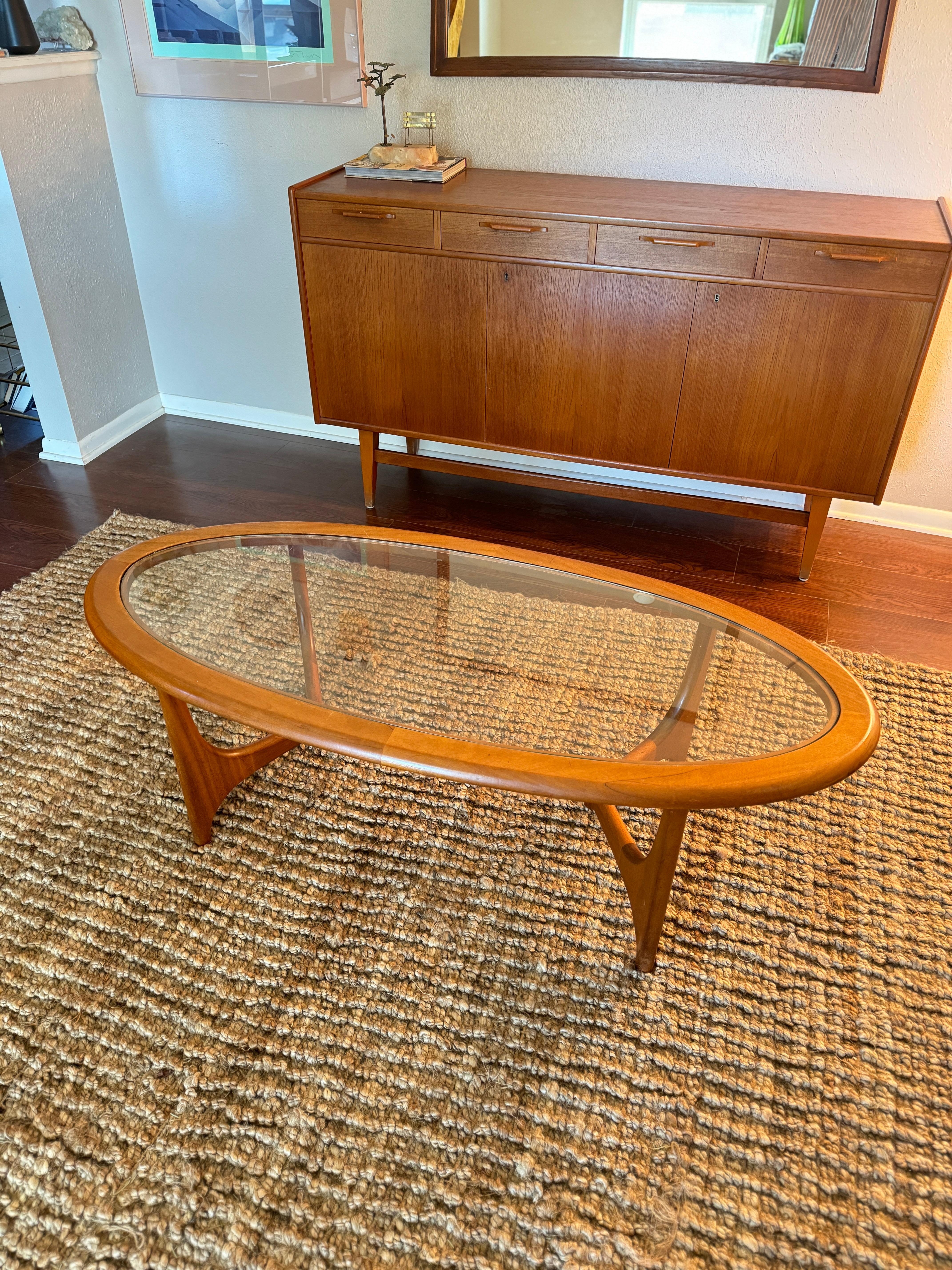Mid century modern coffee table with a glass top by Stonehill, circa 1960s 2