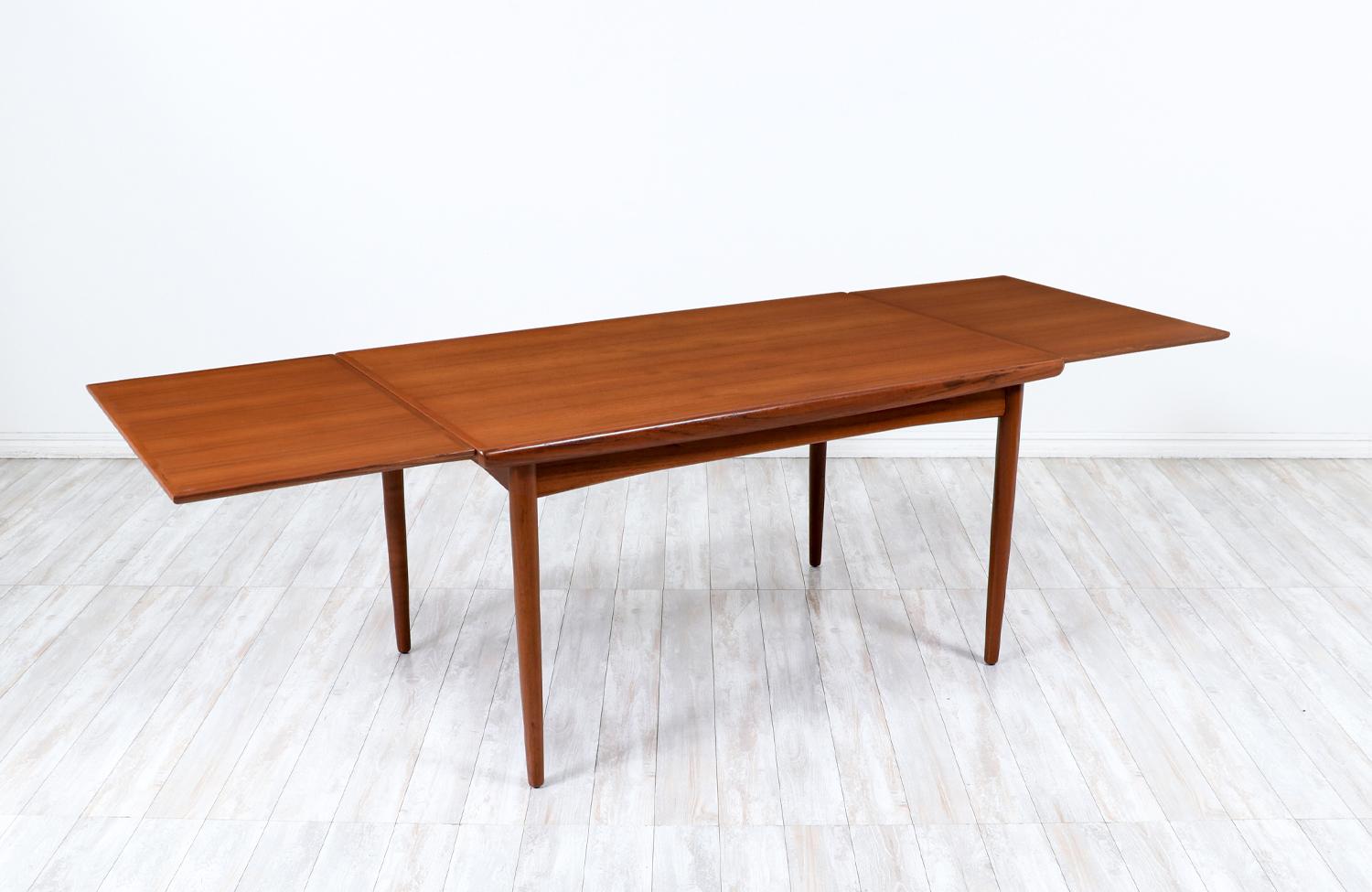 Danish Expertly Restored - Mid-Century Modern Teak Expanding Draw-Leaf Dining Table For Sale