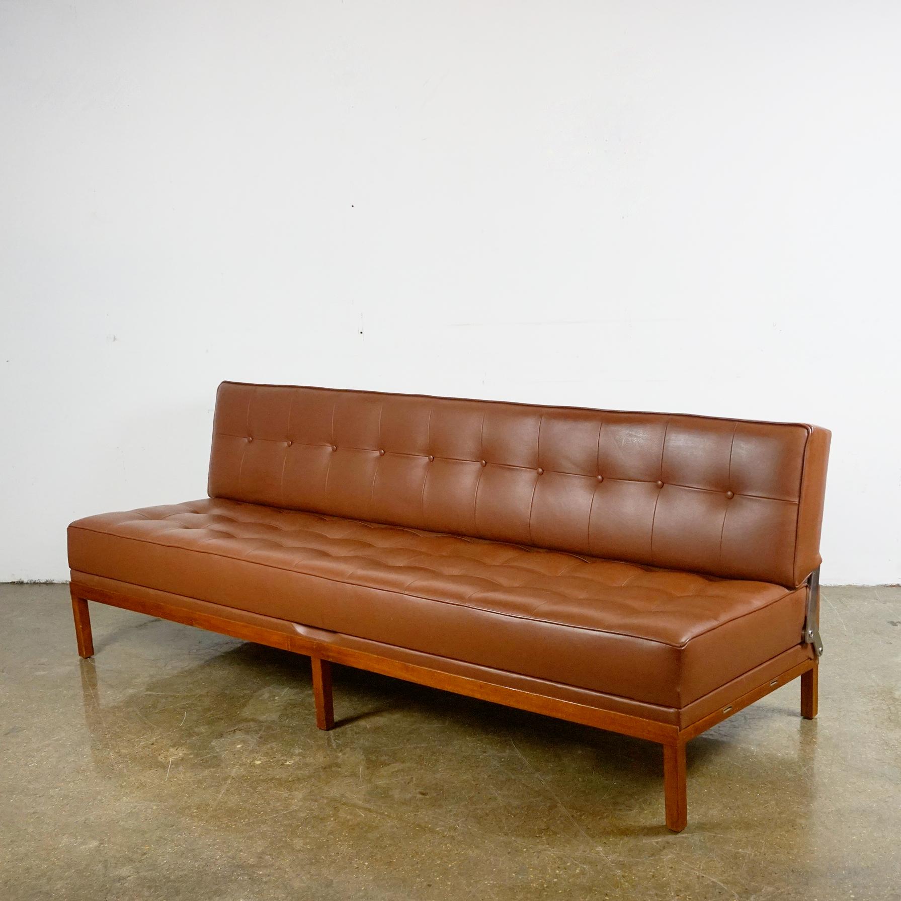 This Austrian Mid-Century Modern vintage sofa or daybed model Constanze with wooden Base and renewed cognac Leather Upholstery was designed by Johannes Spalt 1961 for Wittmann, Etsdorf, Austria. 
It is very easy to handle by one hand to make the
