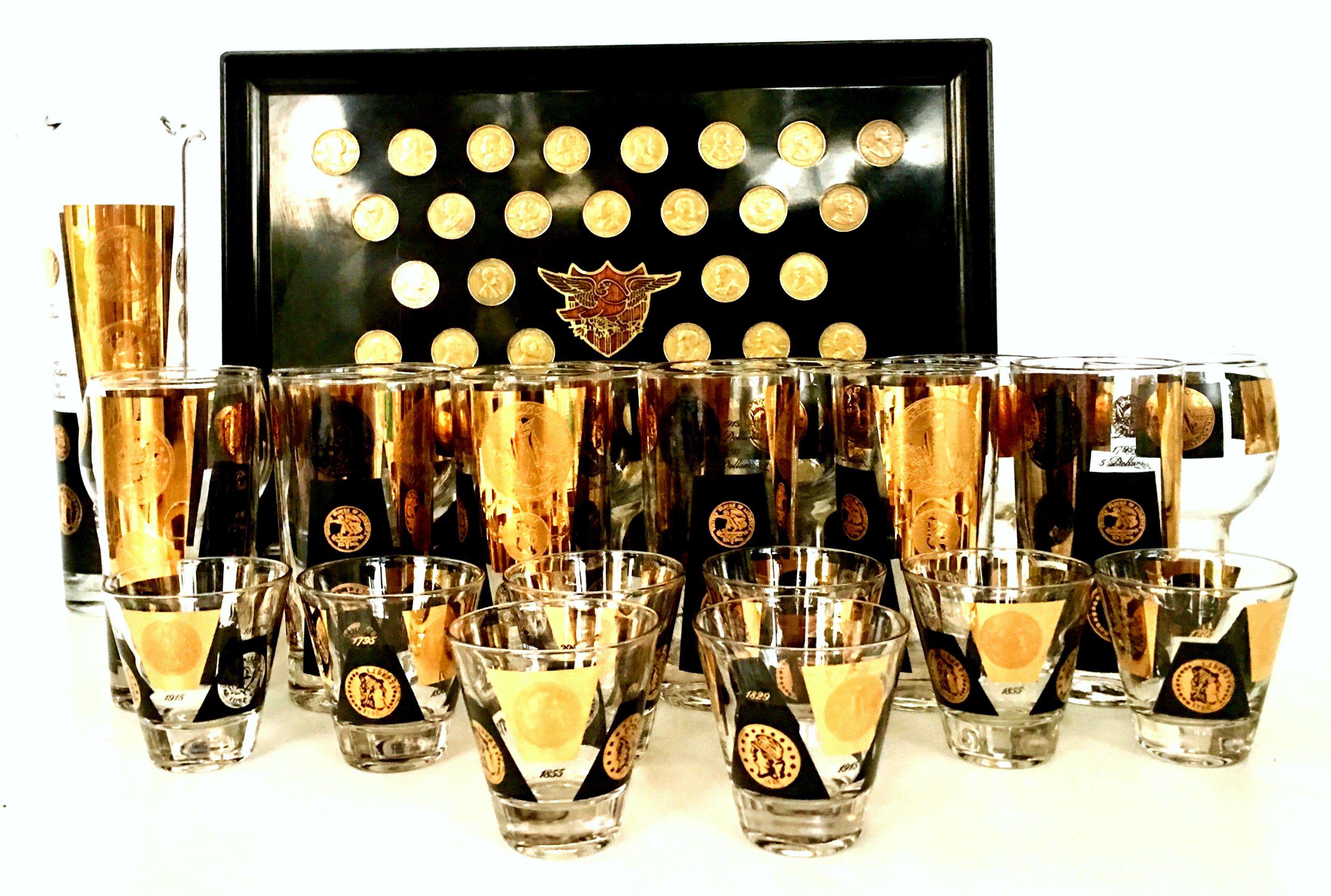 Mid-Century 22K Gold Printed Drink Glasses & Black Lacquer Presidential Coin Tray, Set of 22 Pieces. Includes, 1  serving tray, 1, two spout cocktail pitcher, 6, high ball glasses, 6, pilsner glasses and 8 cocktail glasses. The glasses feature 