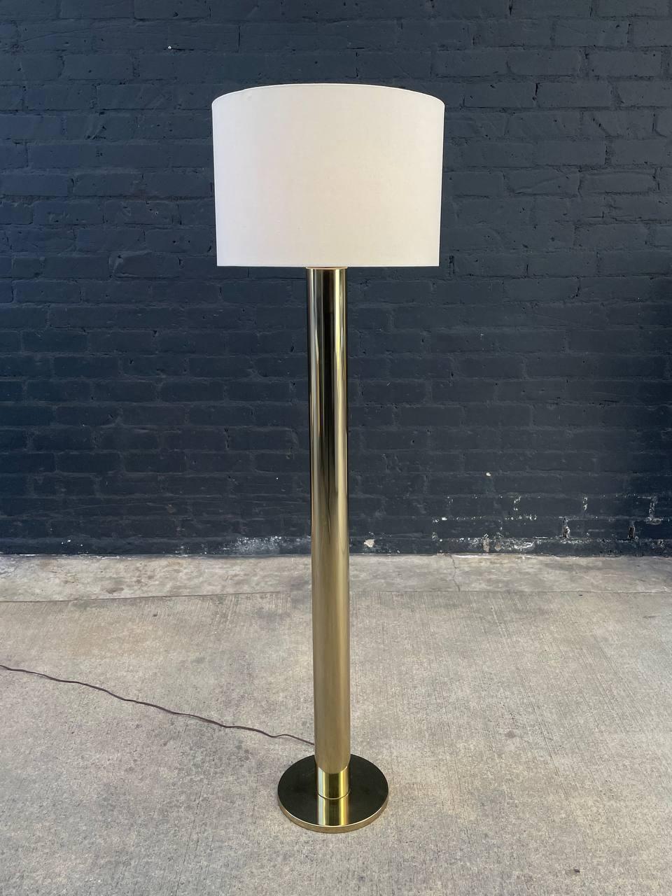 Newly Rewired, New Linen Shade

Dimensions: 
63”H x 11” W x 11” D
Shade:
12”H x 18” W x 18” D

Materials: Brass, New Linen Shade