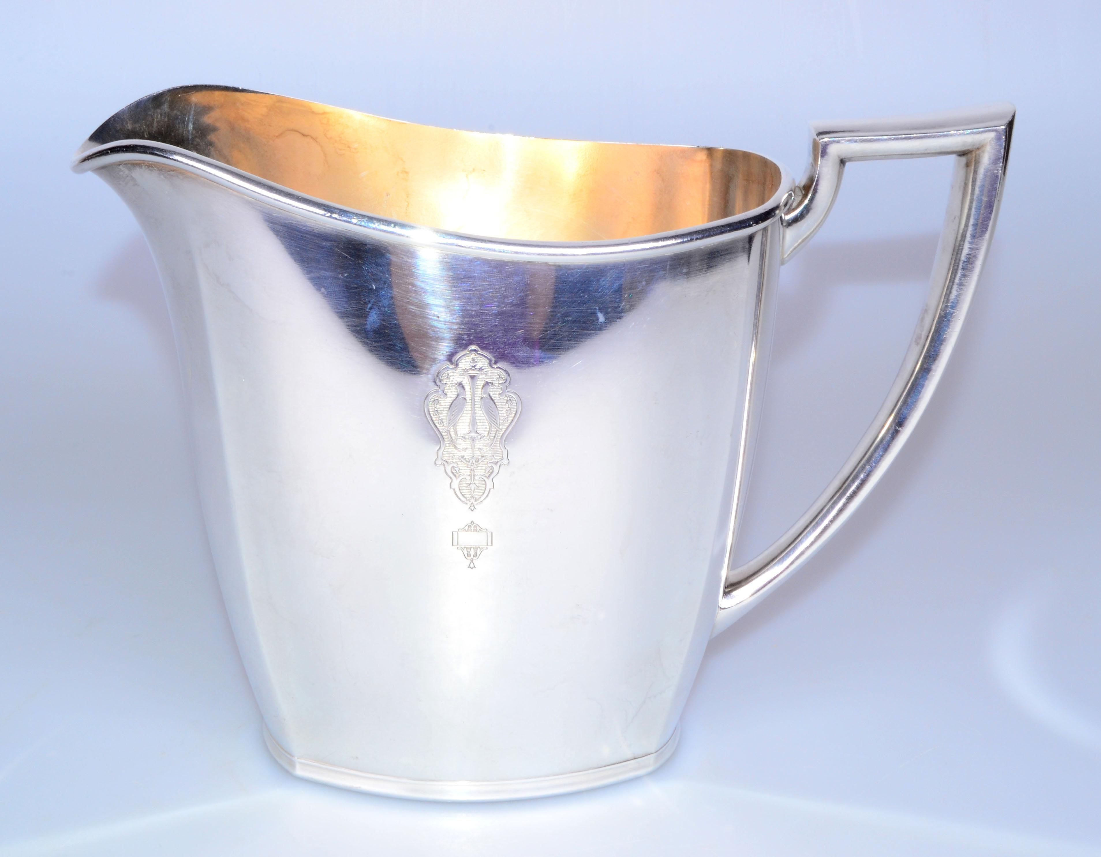 Mid-Century Modern Community plate silver-plated metal water pitcher.
Marked on underside: Community Plate, 12962.