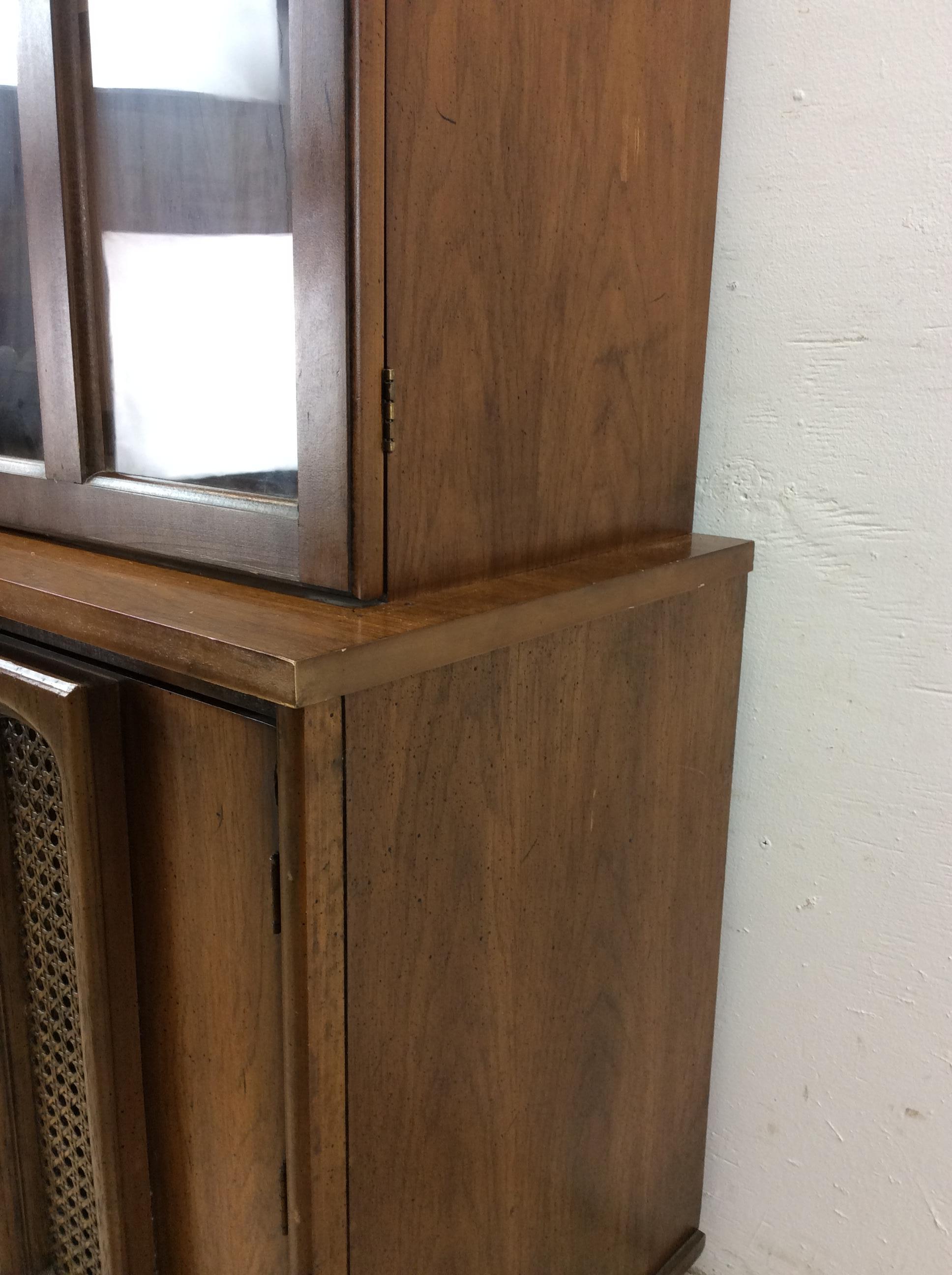 20th Century Mid century modern compact China cabinet with cane doors For Sale