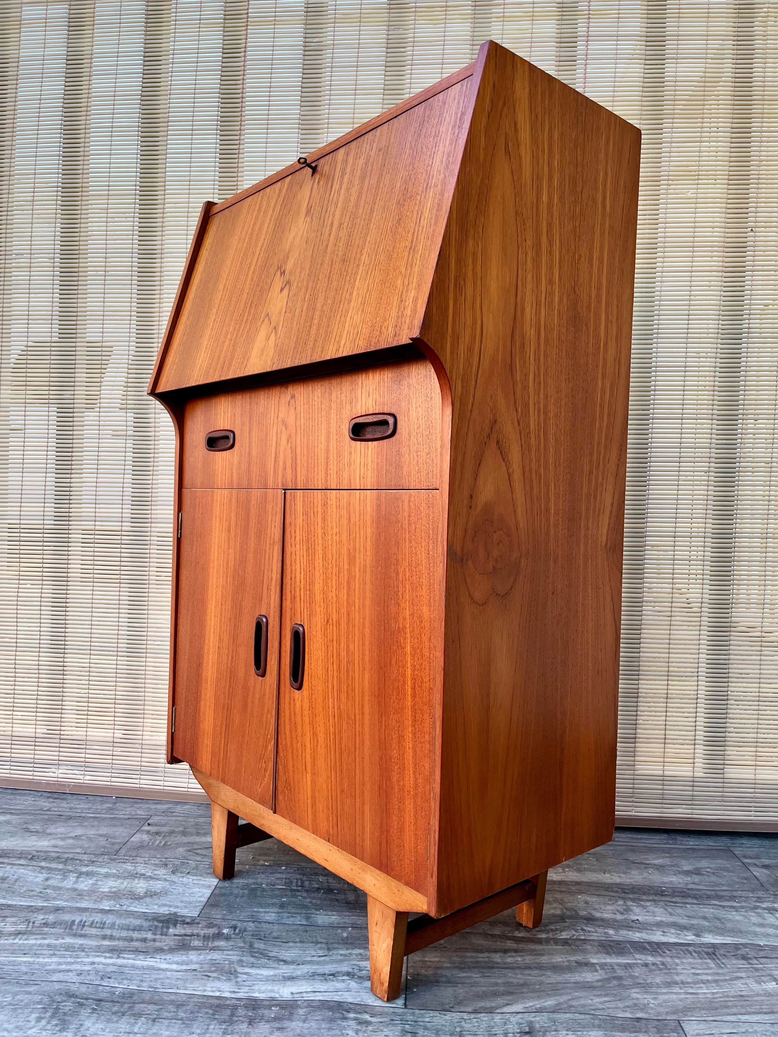 Mid-20th Century Mid Century Modern Compact Drop Down Secretary Desk . Circa 1960s For Sale