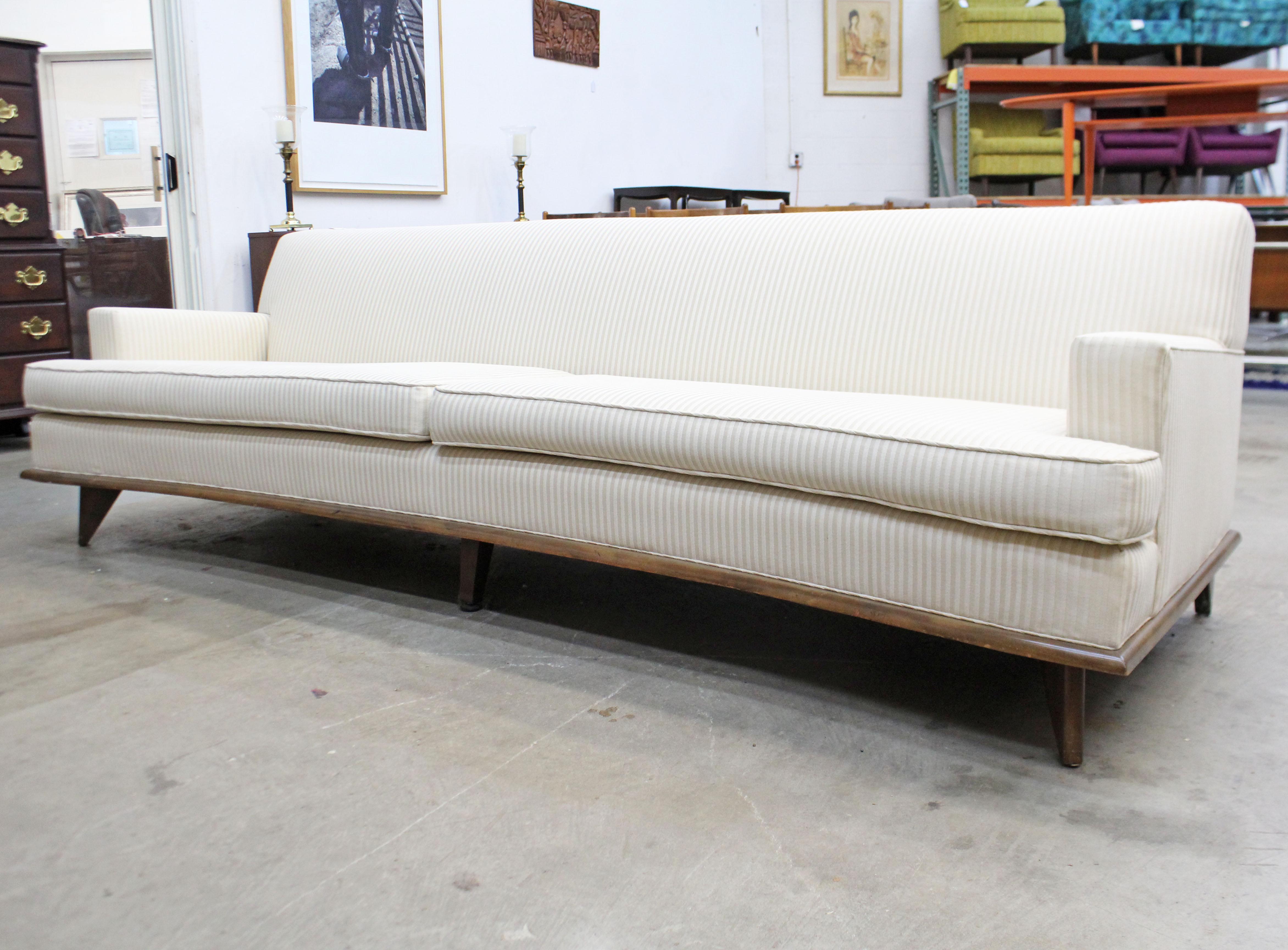 Mid-Century Modern Concave-Front White Sofa on Wood Base 1