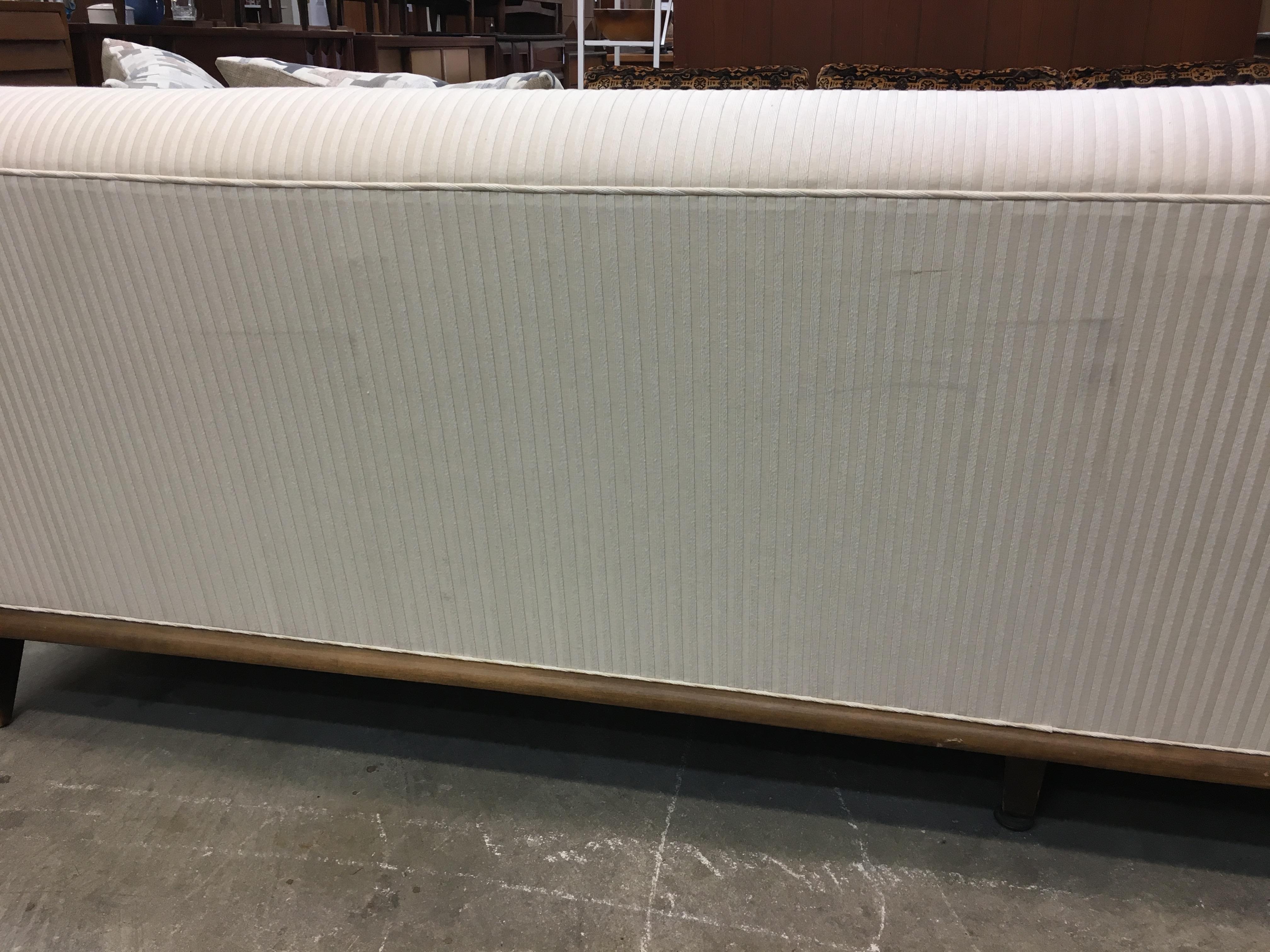 Unknown Mid-Century Modern Concave-Front White Sofa on Wood Base