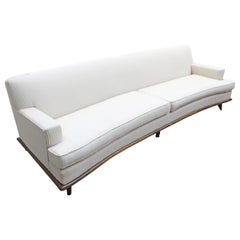 Mid-Century Modern Concave-Front White Sofa on Wood Base
