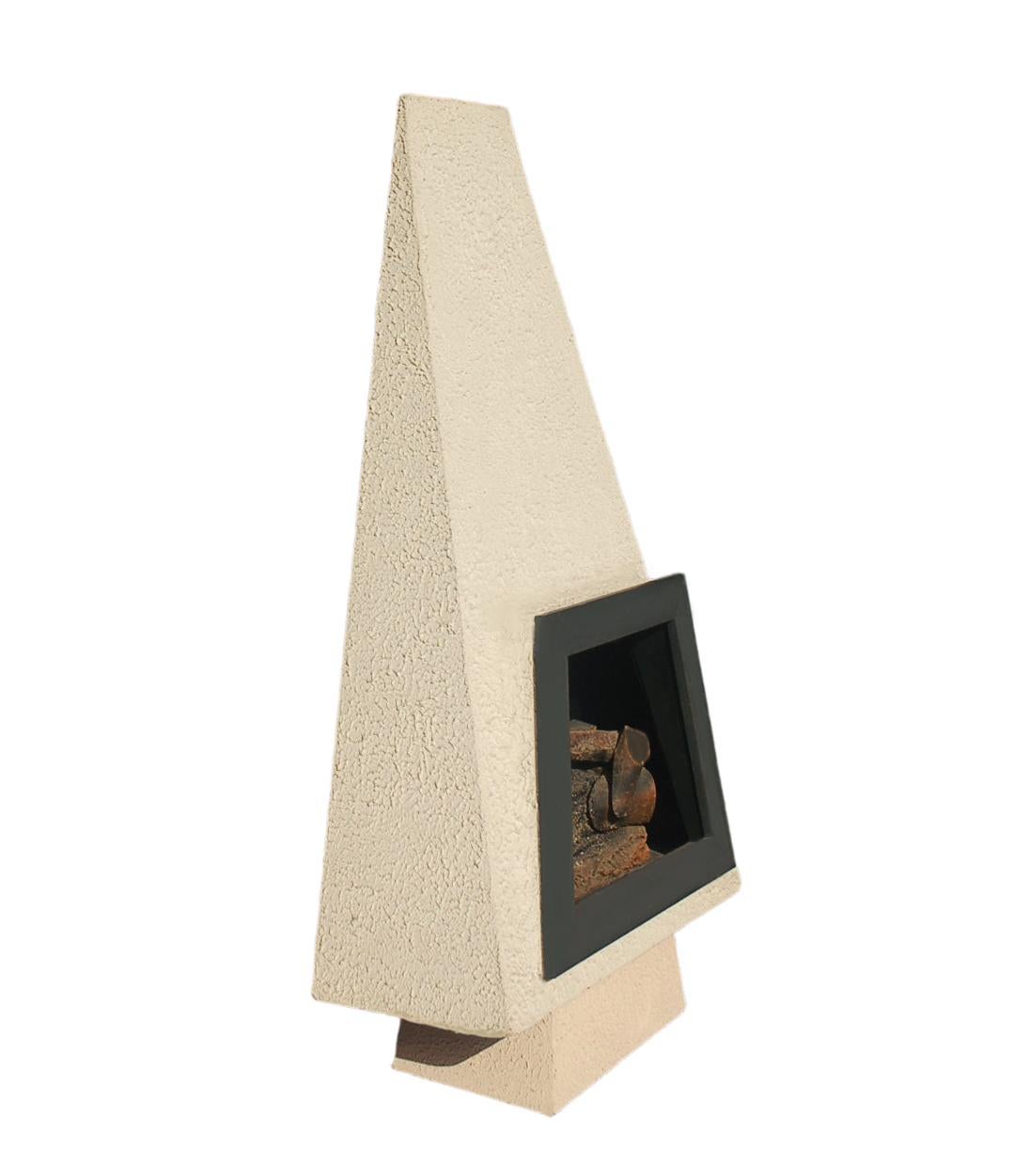 A beautiful modern form fireplace from the 1970s. It features wood and concrete construction. Plugs into wall and works with illuminated faux logs.