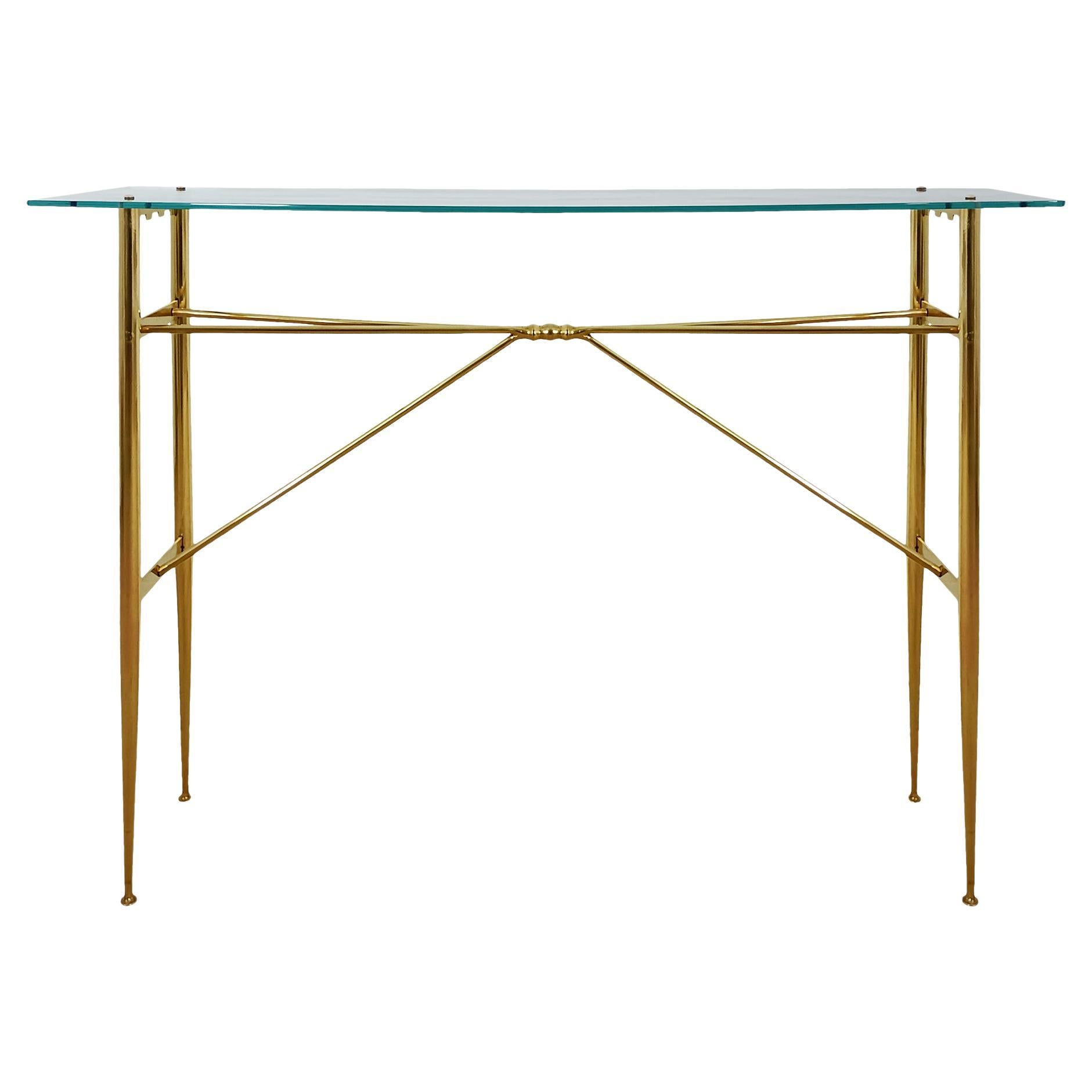 Mesa consola moderna de mediados de siglo en latón macizo y estante de cristal, Italia
