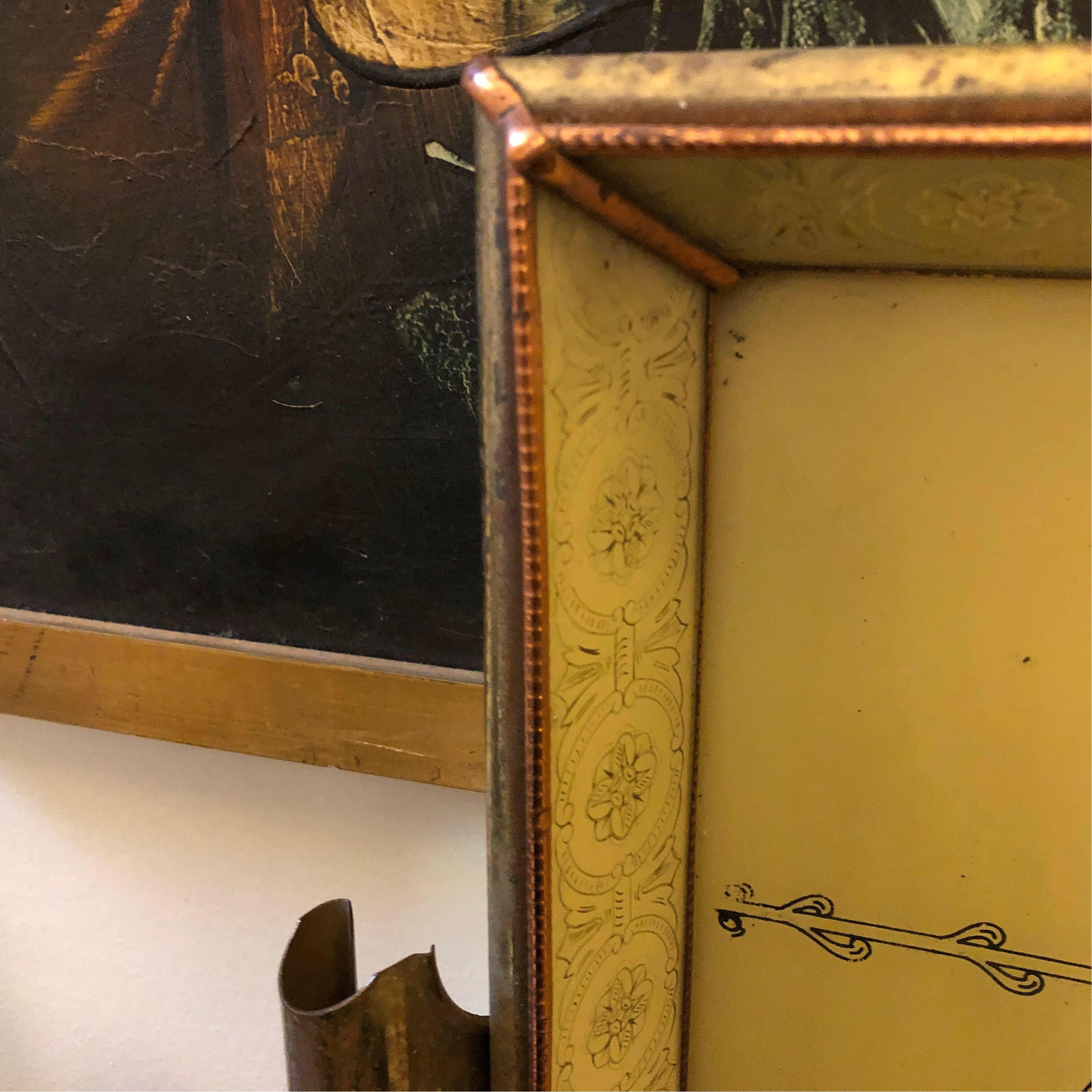 Stylish copper and brass tray made in Italy in the 1950s by MB, the central part is in painted glass. Brass and copper are in original patina, glass is in perfect conditions. It's labeled MB on the bottom.