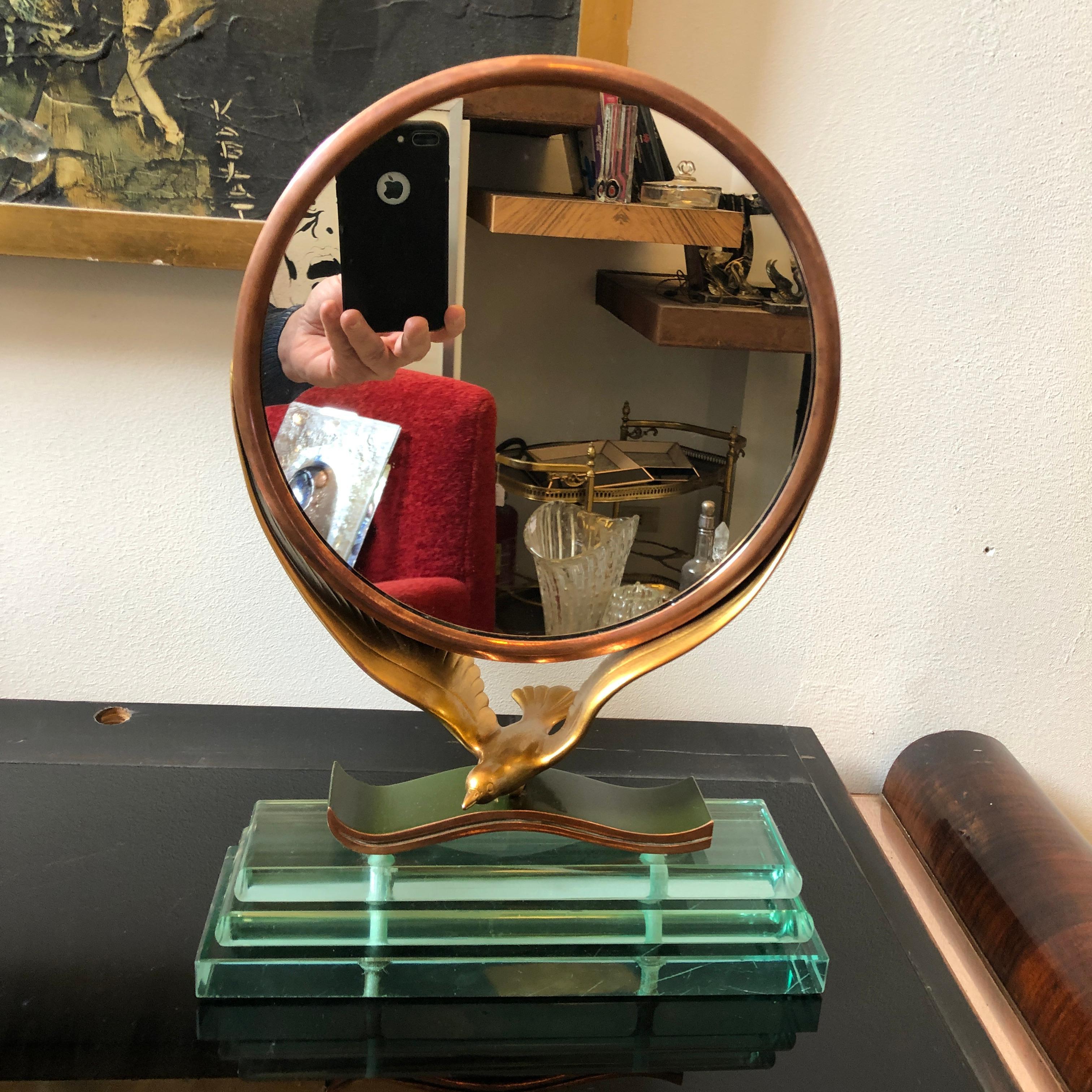 An Amazing Verde Nilo glass and copper table mirror designed and manufactured in Italy in the manner of Fontana Arte, the item has been cleaned and restored in the original colors as you can see on the last four photos where you can see tne item in