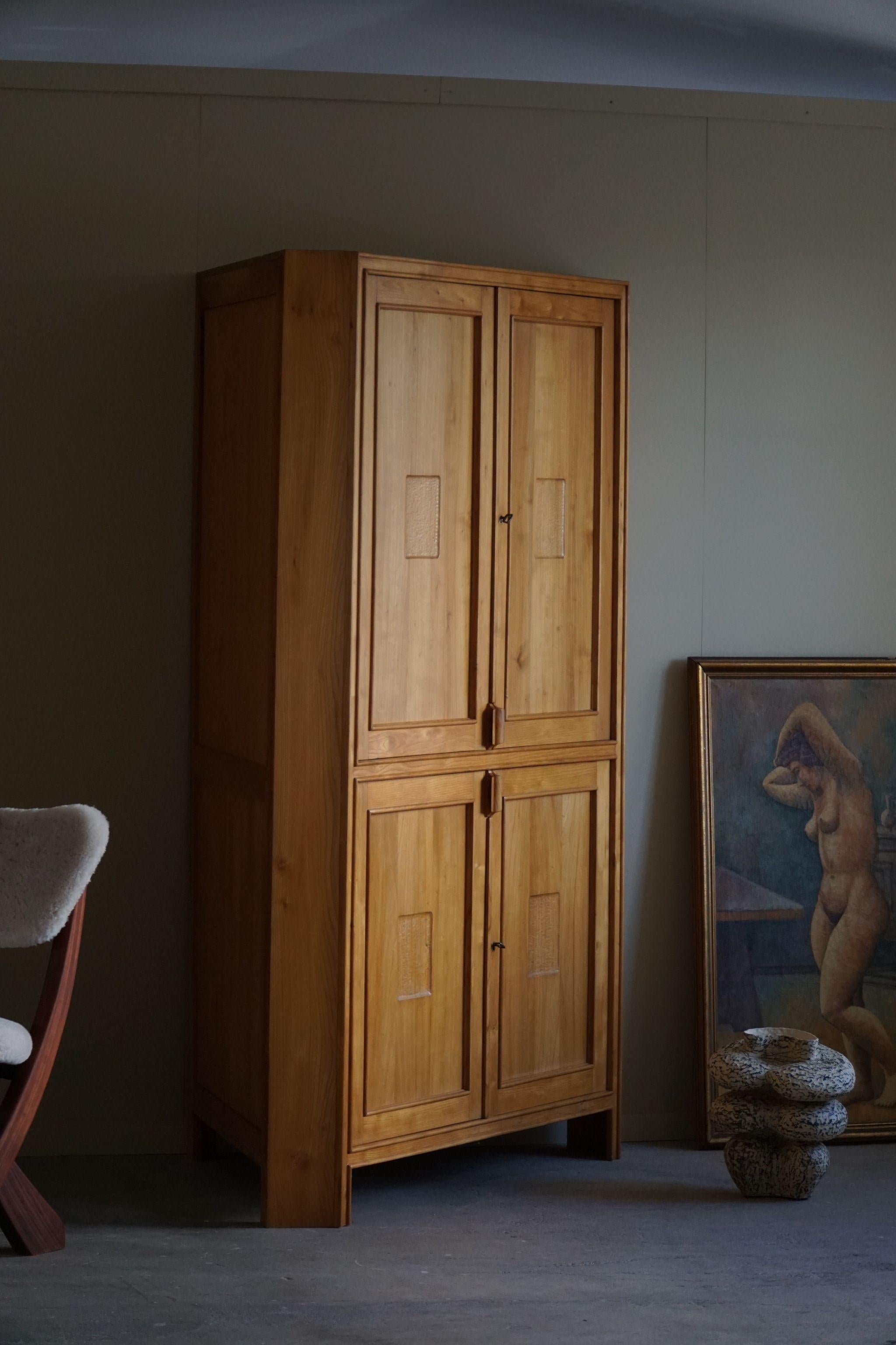 A unique appealing corner cabinet in solid elm. A single made project handcrafted by a Danish cabinetmaker in 1960s. Such nice details and lots of storage space in this vintage piece.

A fantastic brutalist cupboard that will complement many