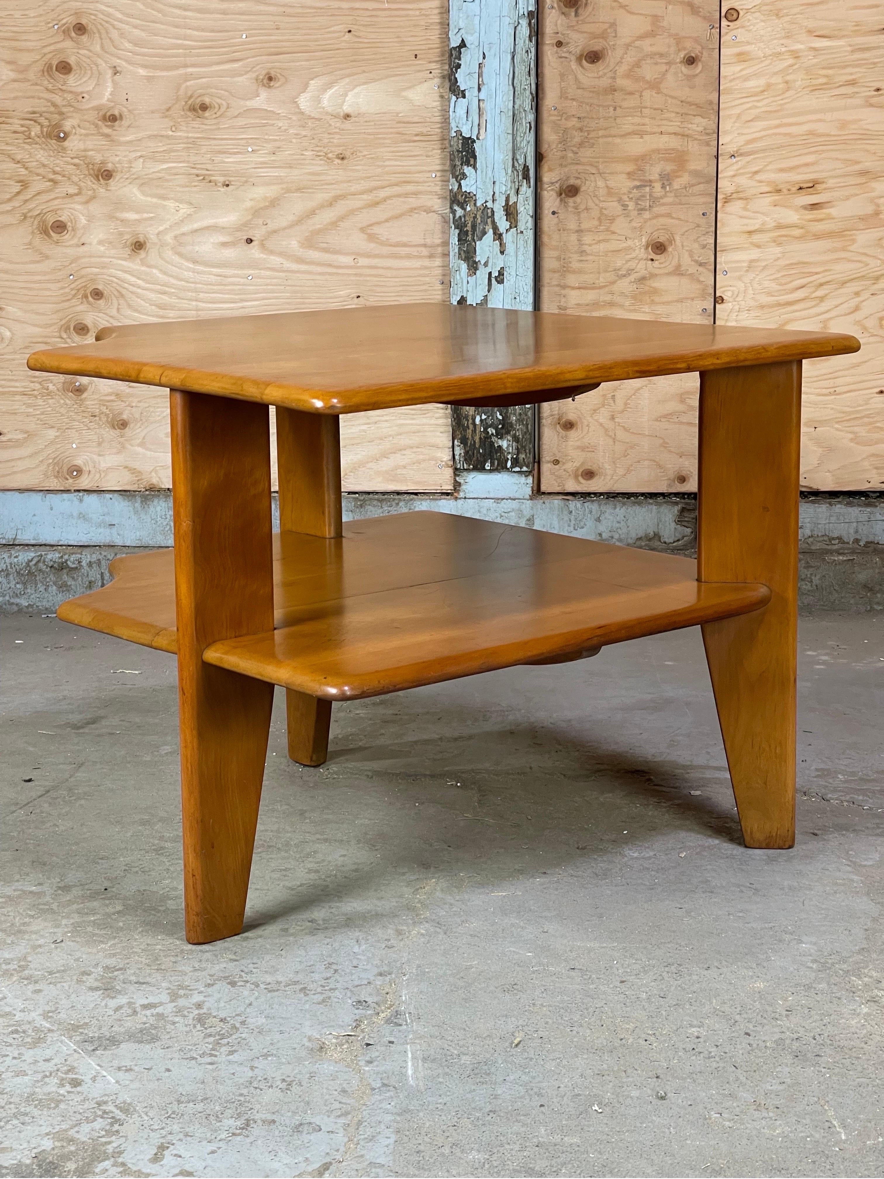 Hard-to-find corner/lamp table by Russel Wright for Conant Ball. Excellent use of form and solid maple. Some wear throughout but still displays wonderfully - please see pics. 
*Please request via message for a reduced cost shipping quote with your