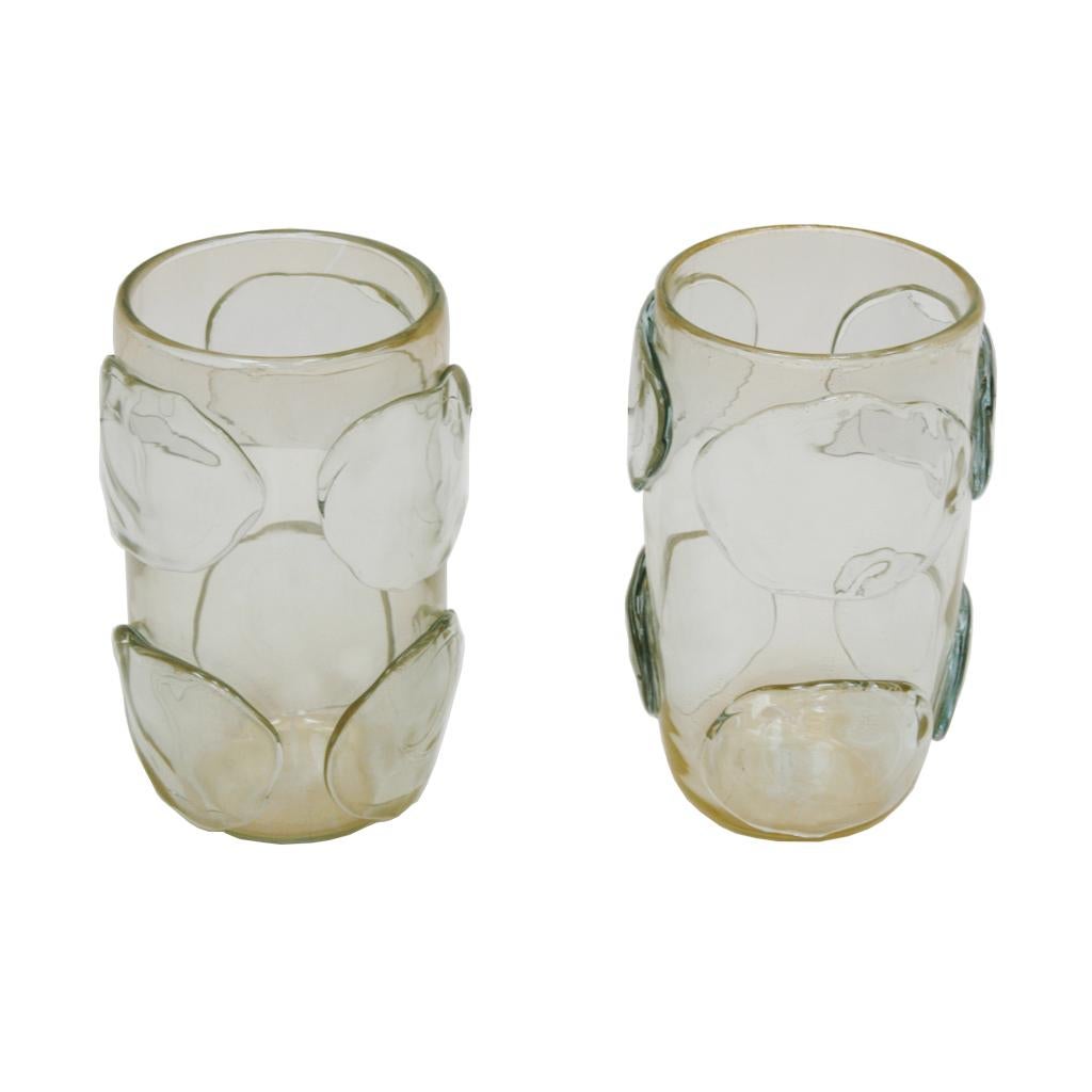 Pair of Murano hand blown vases made of opaline glass by the Italian artist glassblower Costantini. The body is decorated with round freeform reliefs.
These exquisite Venetian vases are signed underneath, Italy, 1980s.
  