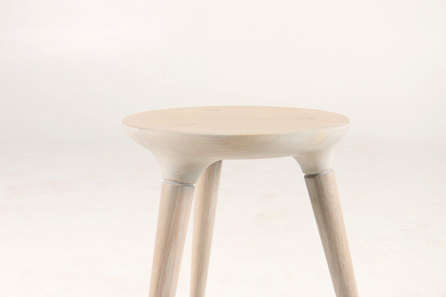 The three-legged Coventry Stool by Studio DUNN is handcrafted in New England from solid White Oak and finished with a Vintage White oil finish. Only 1 stool remains in this limited-edition series.

We hand mix and apply our custom finishes to each