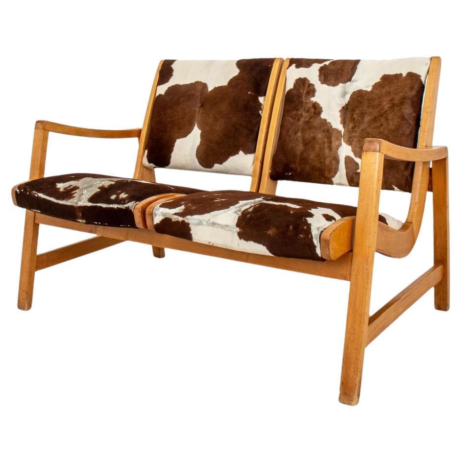 Mid-Century Modern Cow Hide Upholstered Settee For Sale