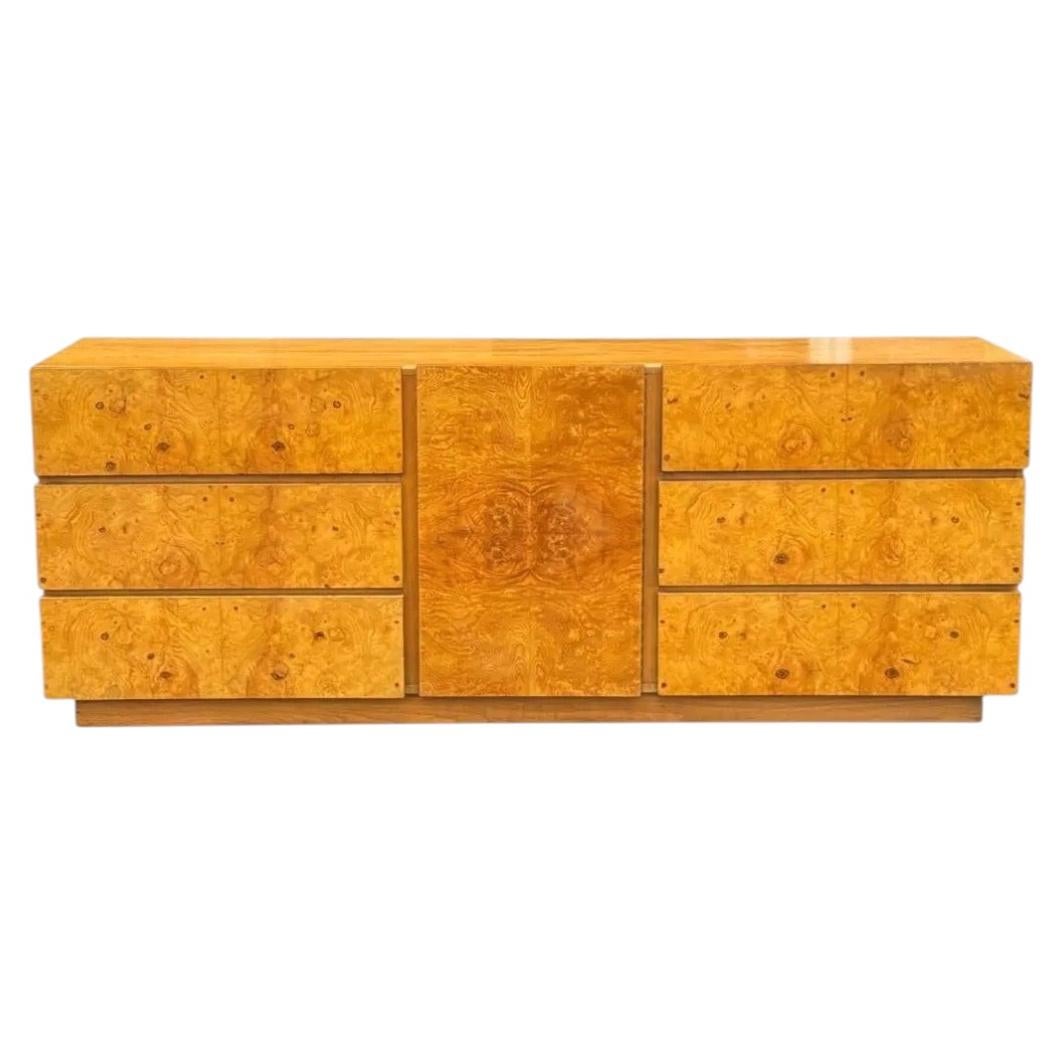 Mid century modern credenza by Lane Furniture. Case clad in richly figured burl
