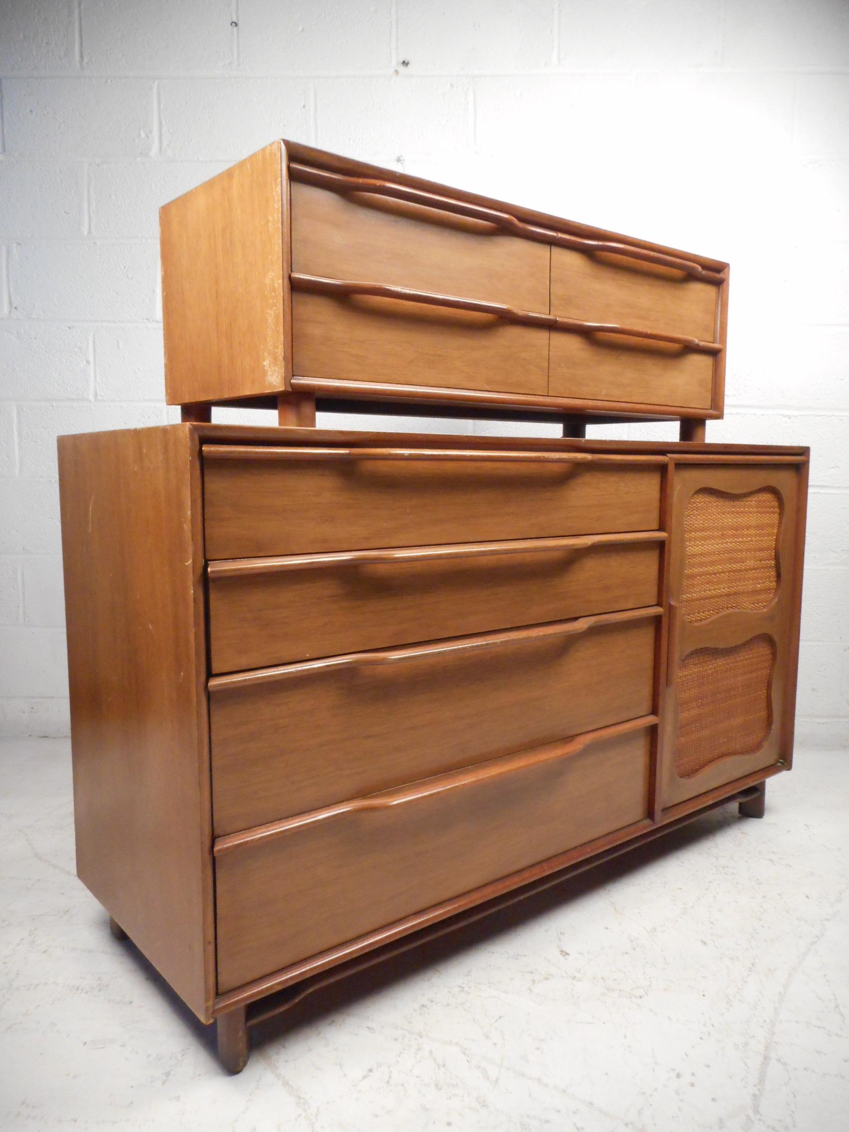 Uniquely well-crafted midcentury credenza with a topper chest, by Hickory, circa 1960s. Sturdy mahogany construction. A stylish design featuring handsome sculpted drawer pulls on spacious dovetail jointed drawers, and two well-preserved cane