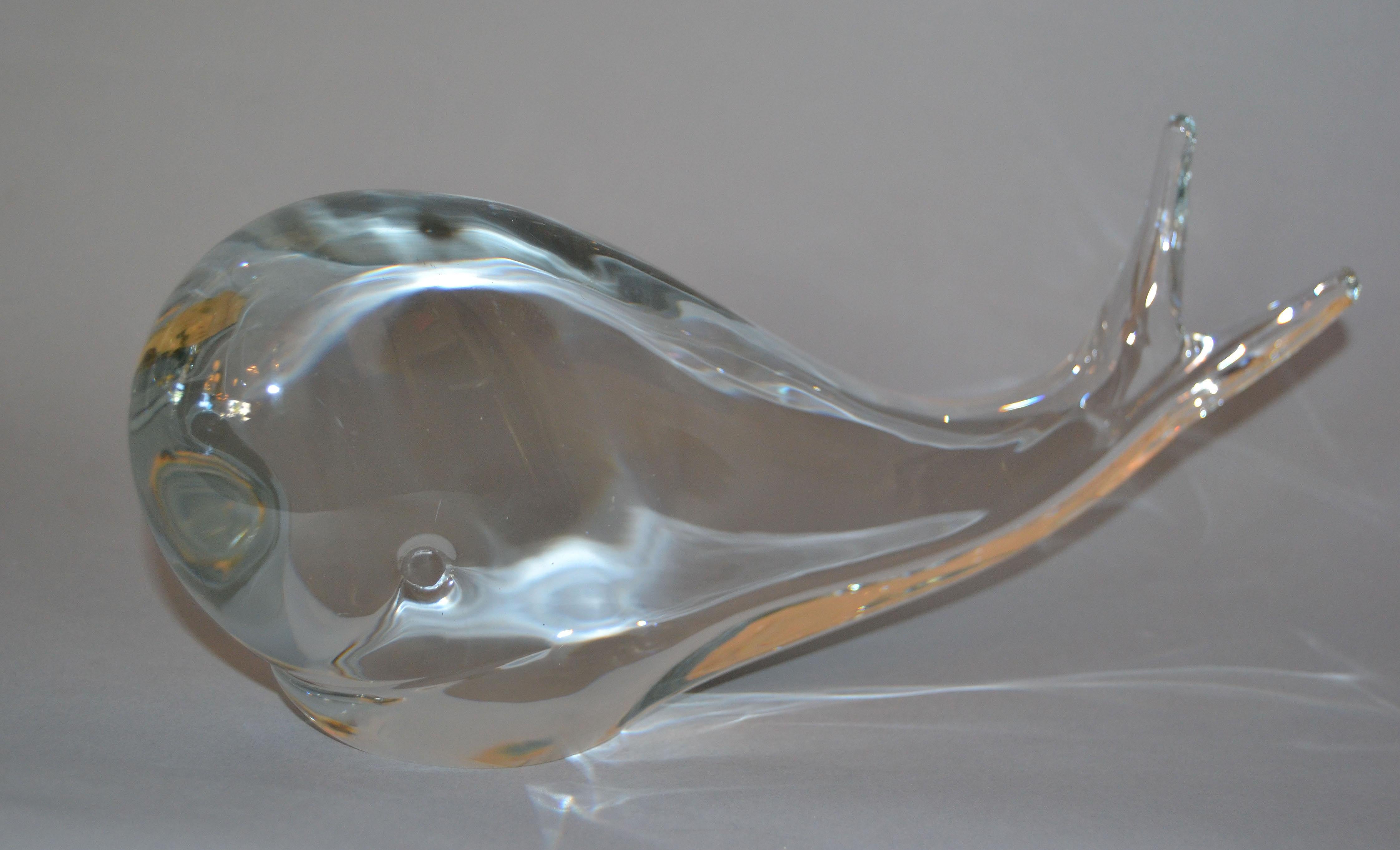 Mid-Century Modern crystal art glass whale by FM Ronneby Konstglas, Sweden.
Etched Markings on the bottom.
An amazing animal sculpture or a practical paperweight.